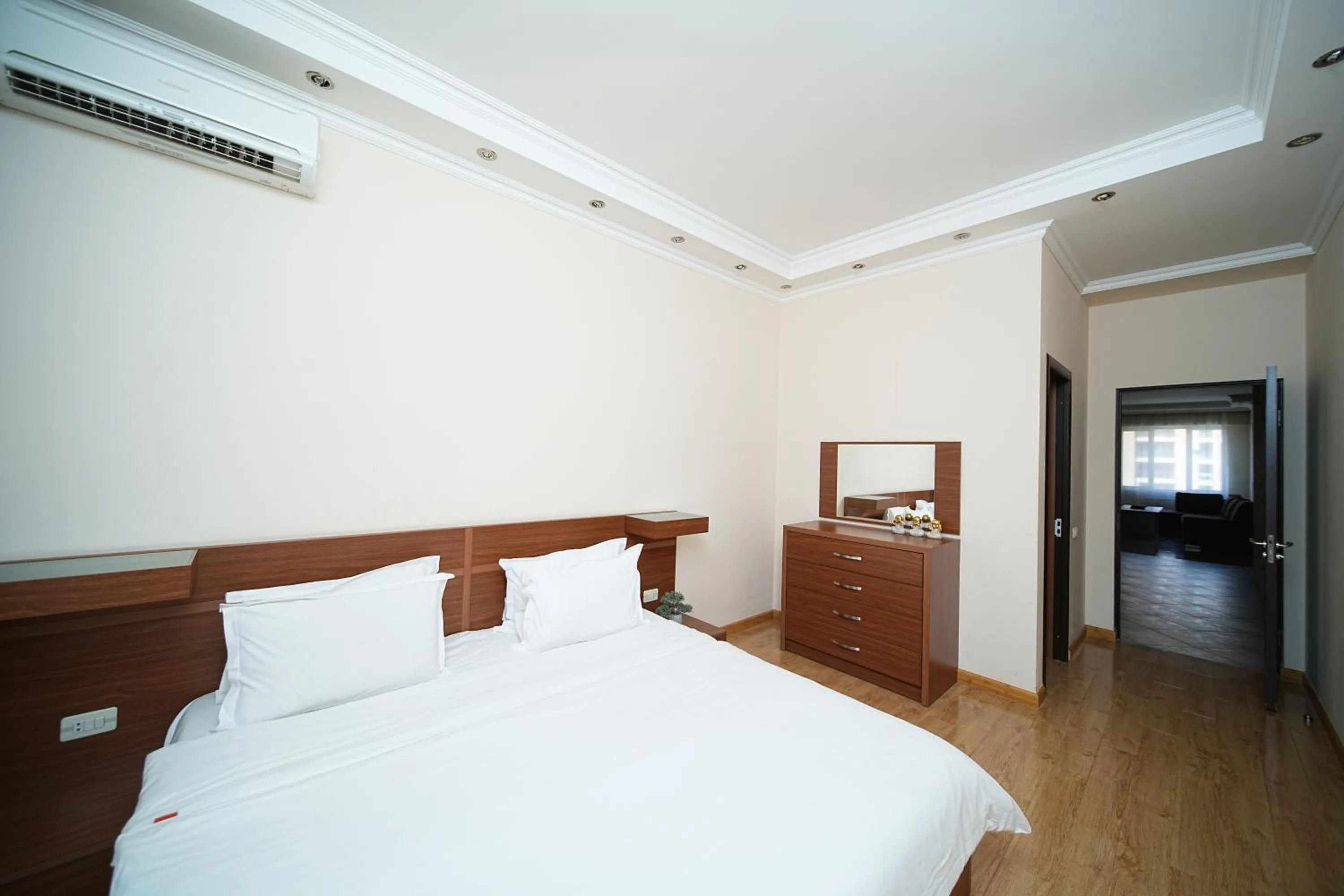 Bed in Sweet Home Apart-Hotel