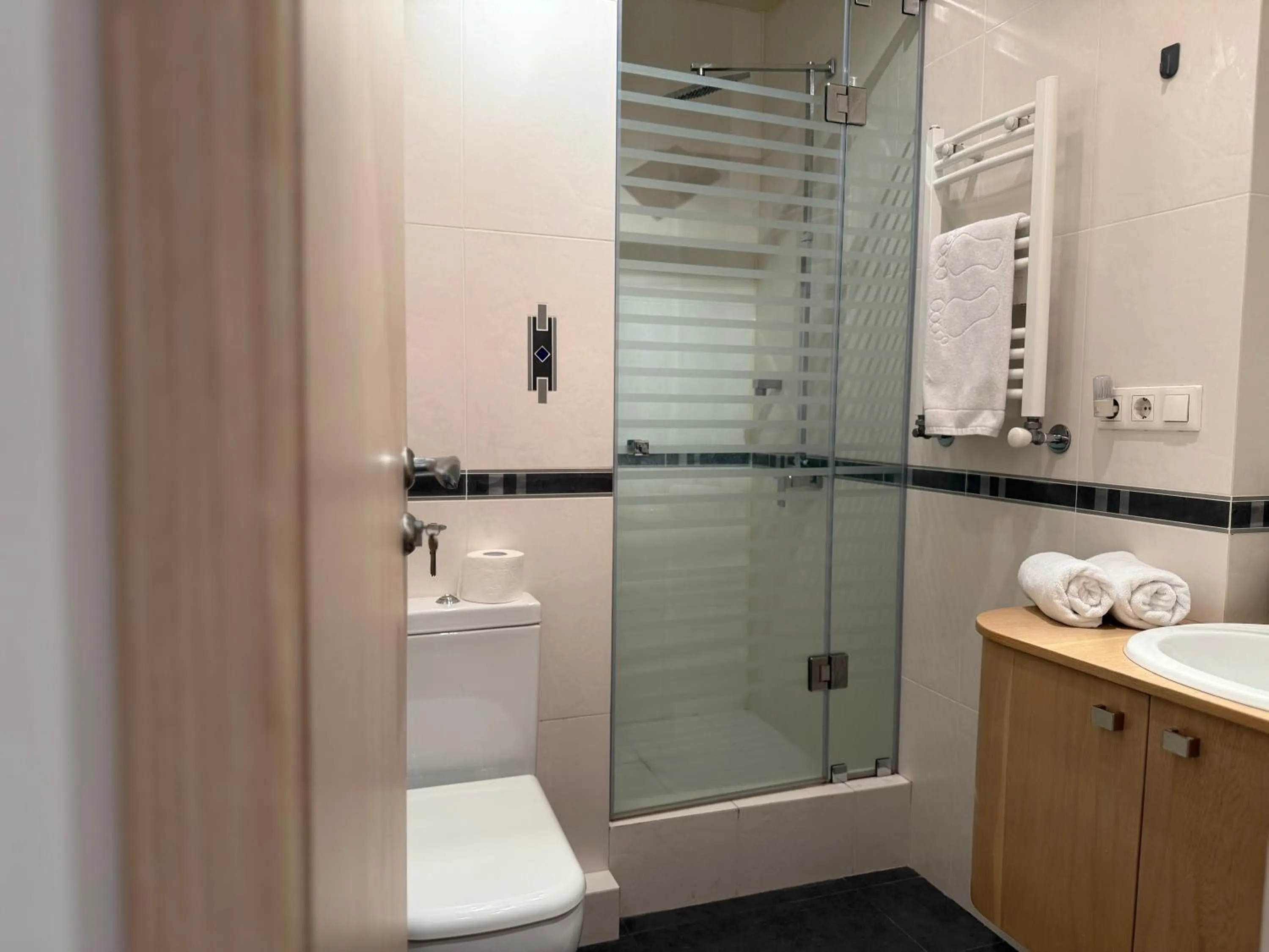 Shower in Sweet Home Apart-Hotel