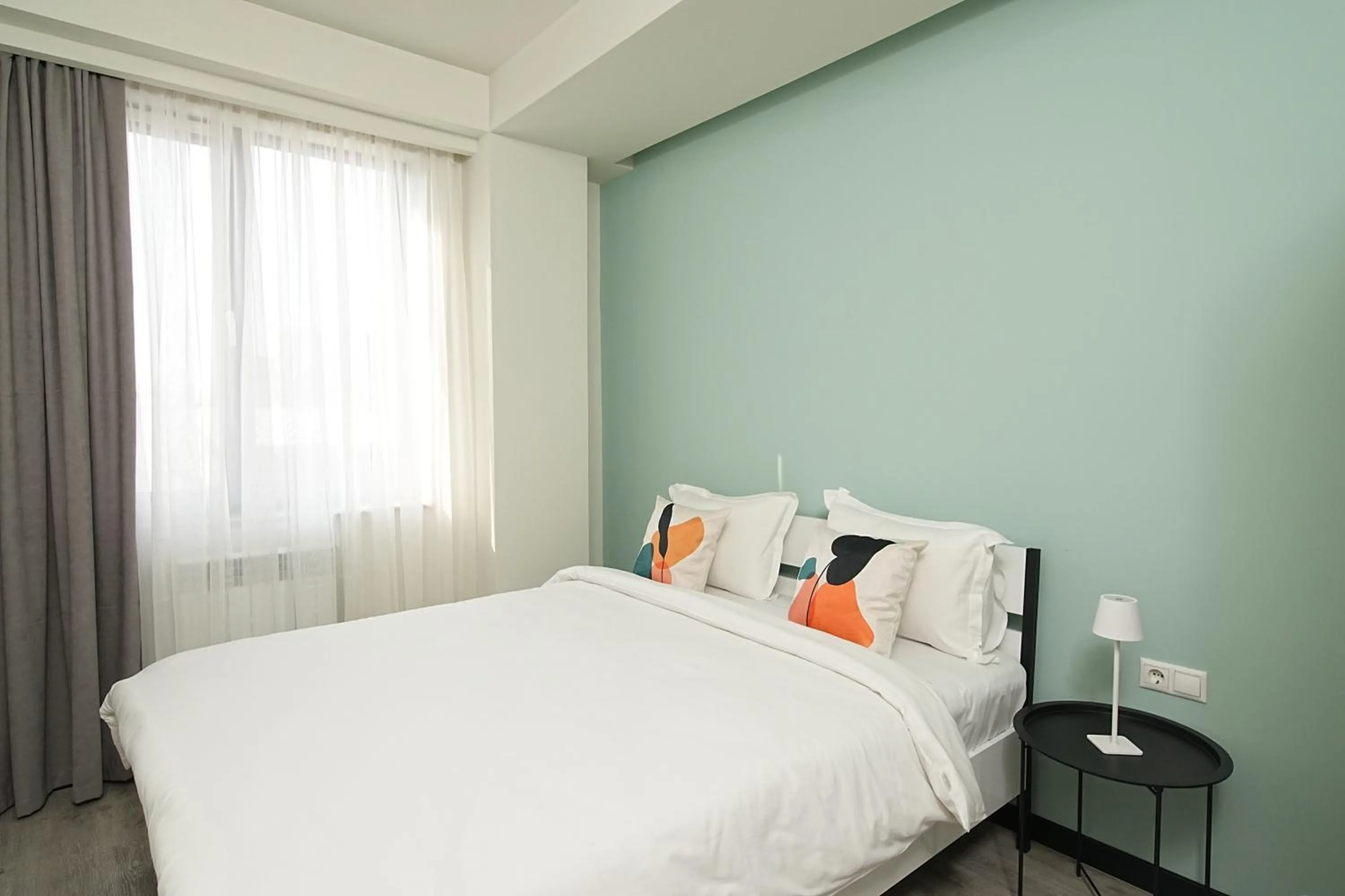 Bed in Sweet Home Apart-Hotel