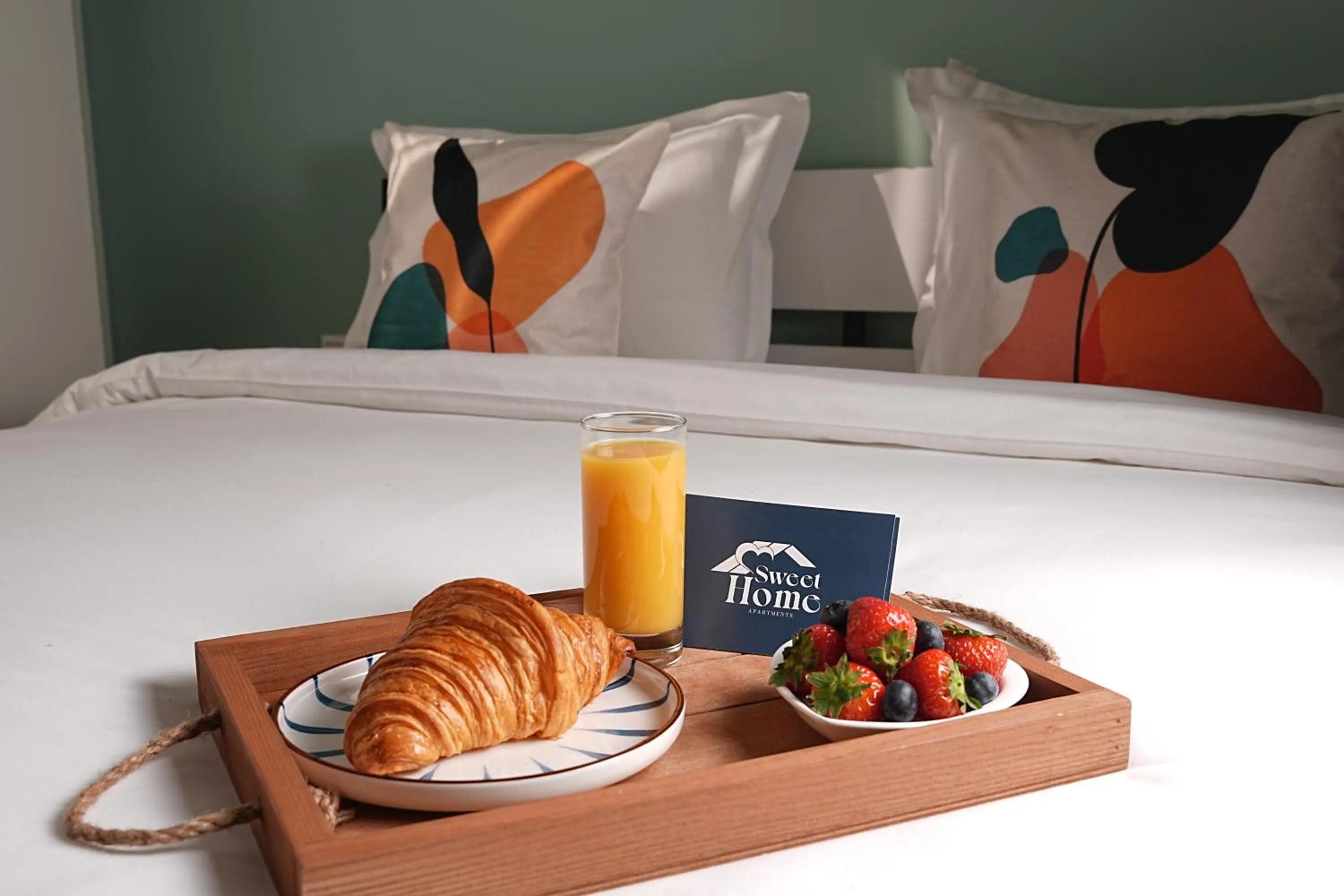 Bed in Sweet Home Apart-Hotel