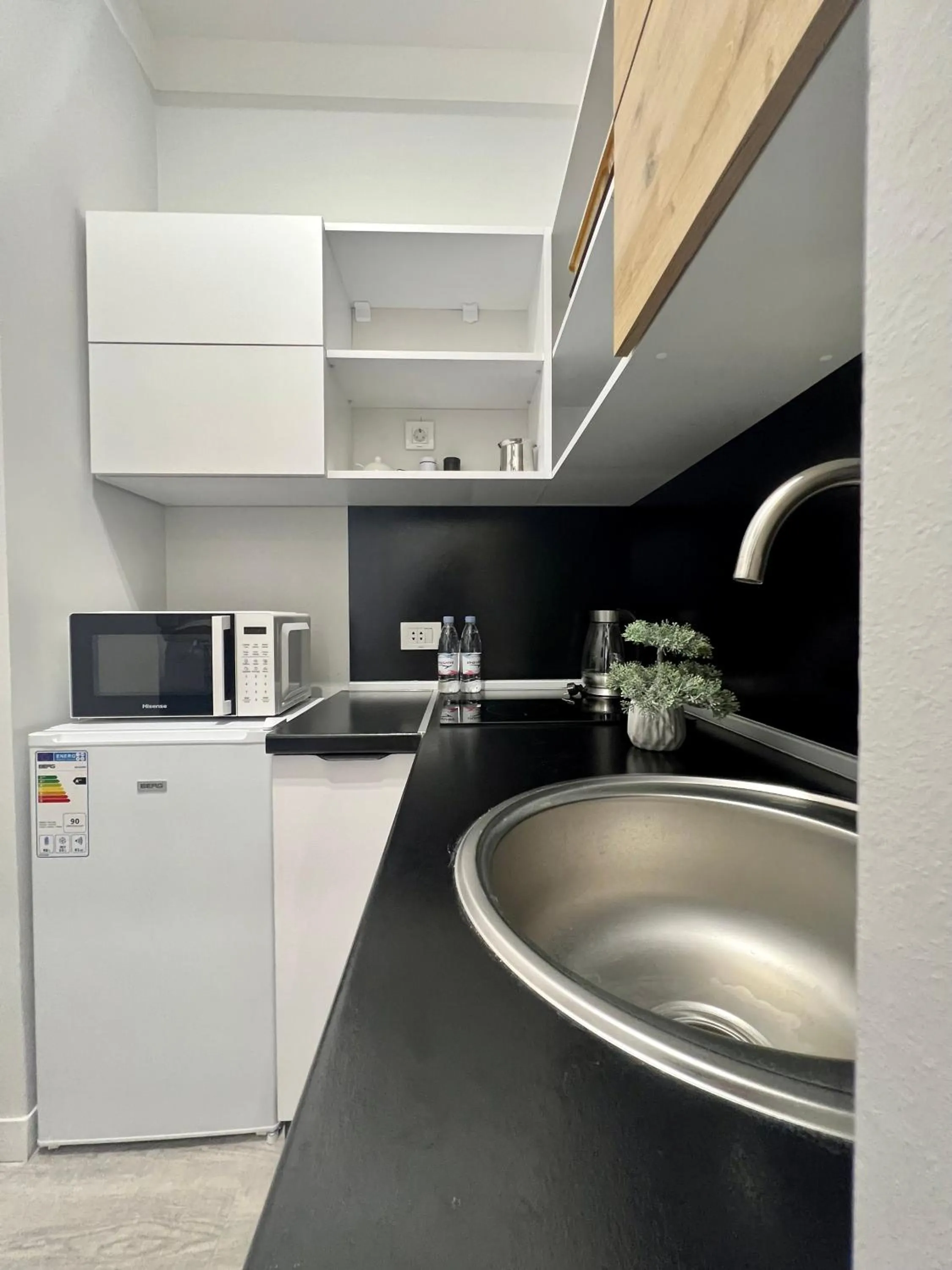 Kitchen or kitchenette in Sweet Home Apart-Hotel