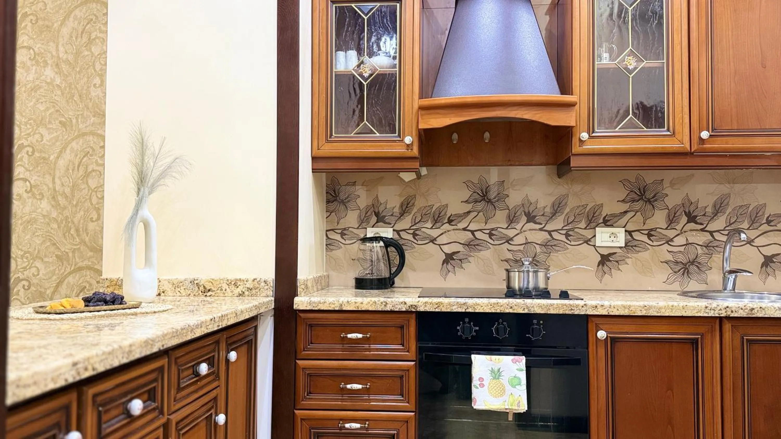 Kitchen or kitchenette in Sweet Home Apart-Hotel