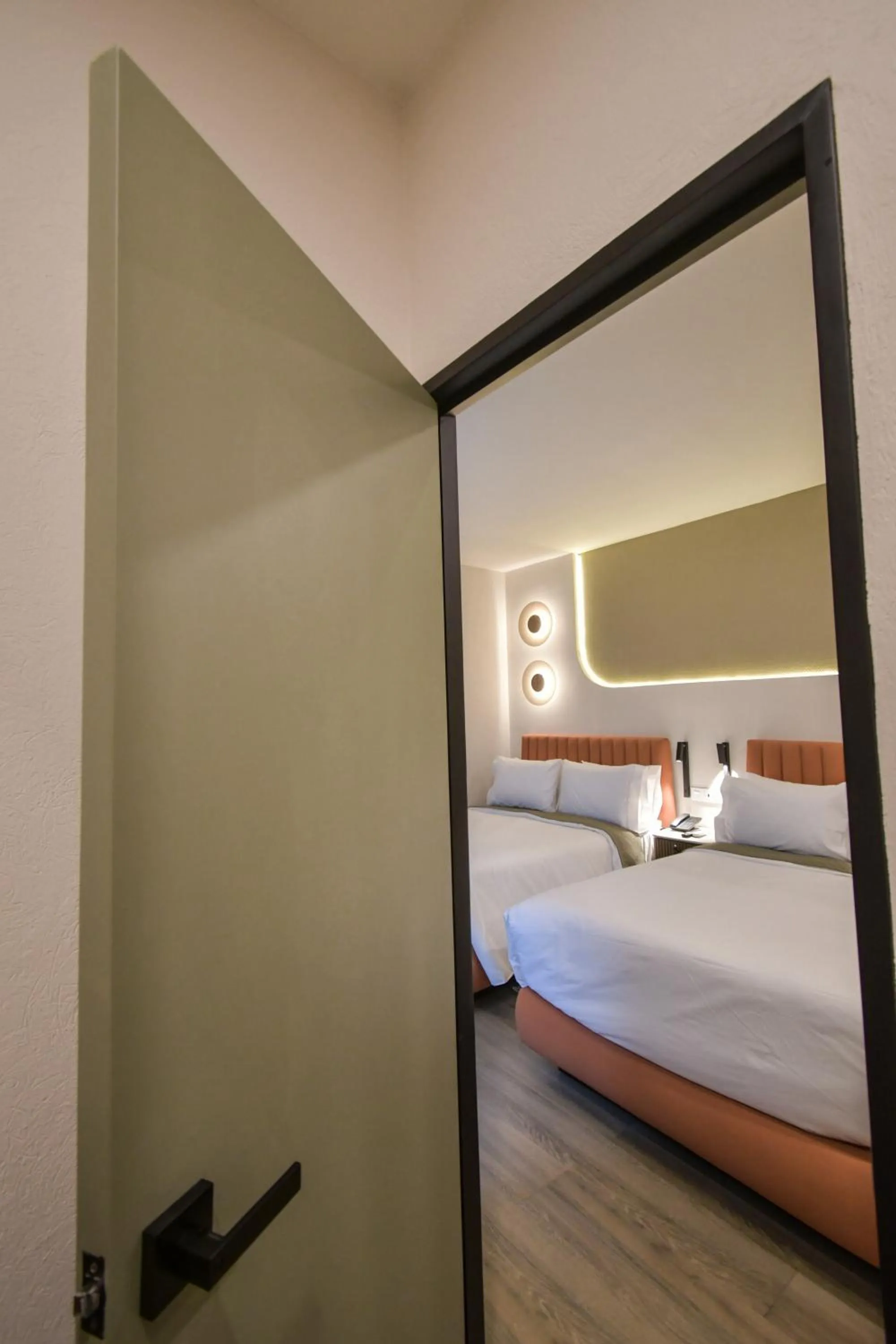 Bed in Expo Satelite 2750 Hotel & Suites