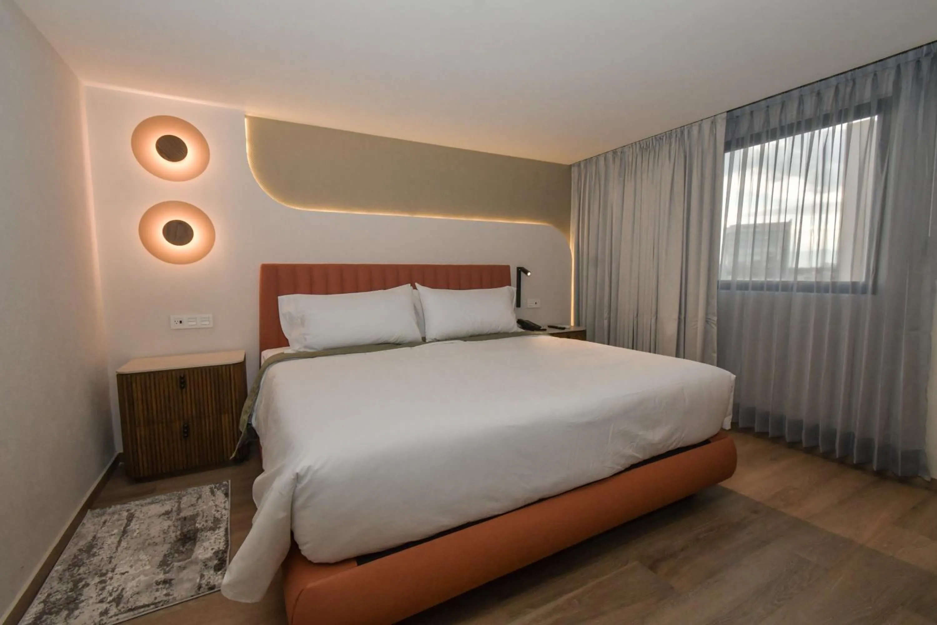 Bed in Expo Satelite 2750 Hotel & Suites