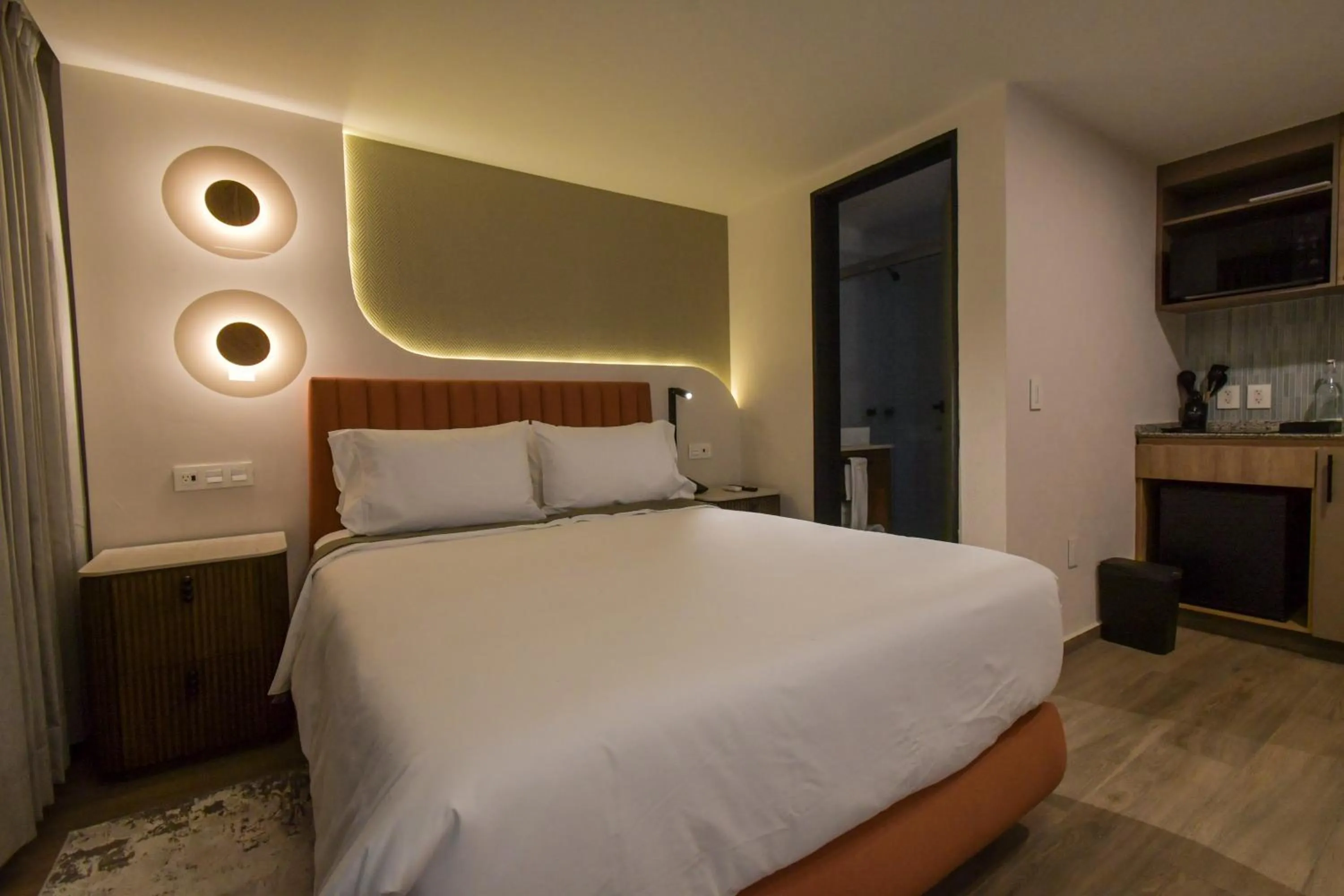 Bed in Expo Satelite 2750 Hotel & Suites