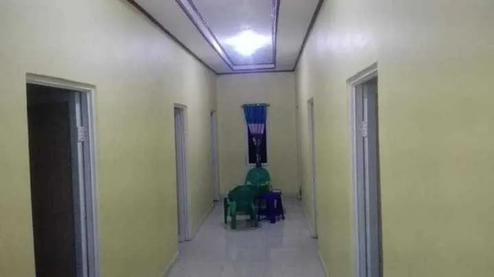 Facade/entrance in Hotel O Wisma Nadira Near SPBU PT. Trijaya Pugung PENENGAHAN