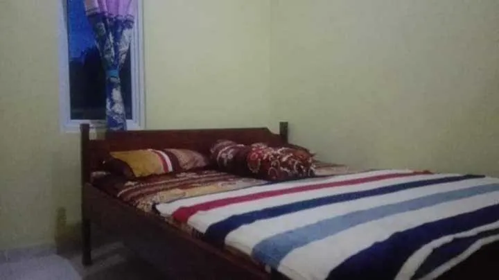 Bedroom, Bed in Hotel O Wisma Nadira Near SPBU PT. Trijaya Pugung PENENGAHAN