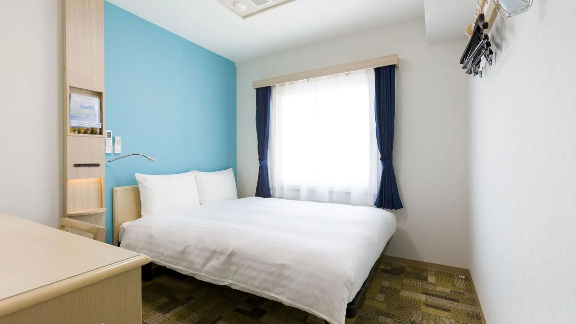 Bedroom, Bed in Toyoko Inn Tokyo Keio-sen Higashi-fuchu-eki Kita-guchi