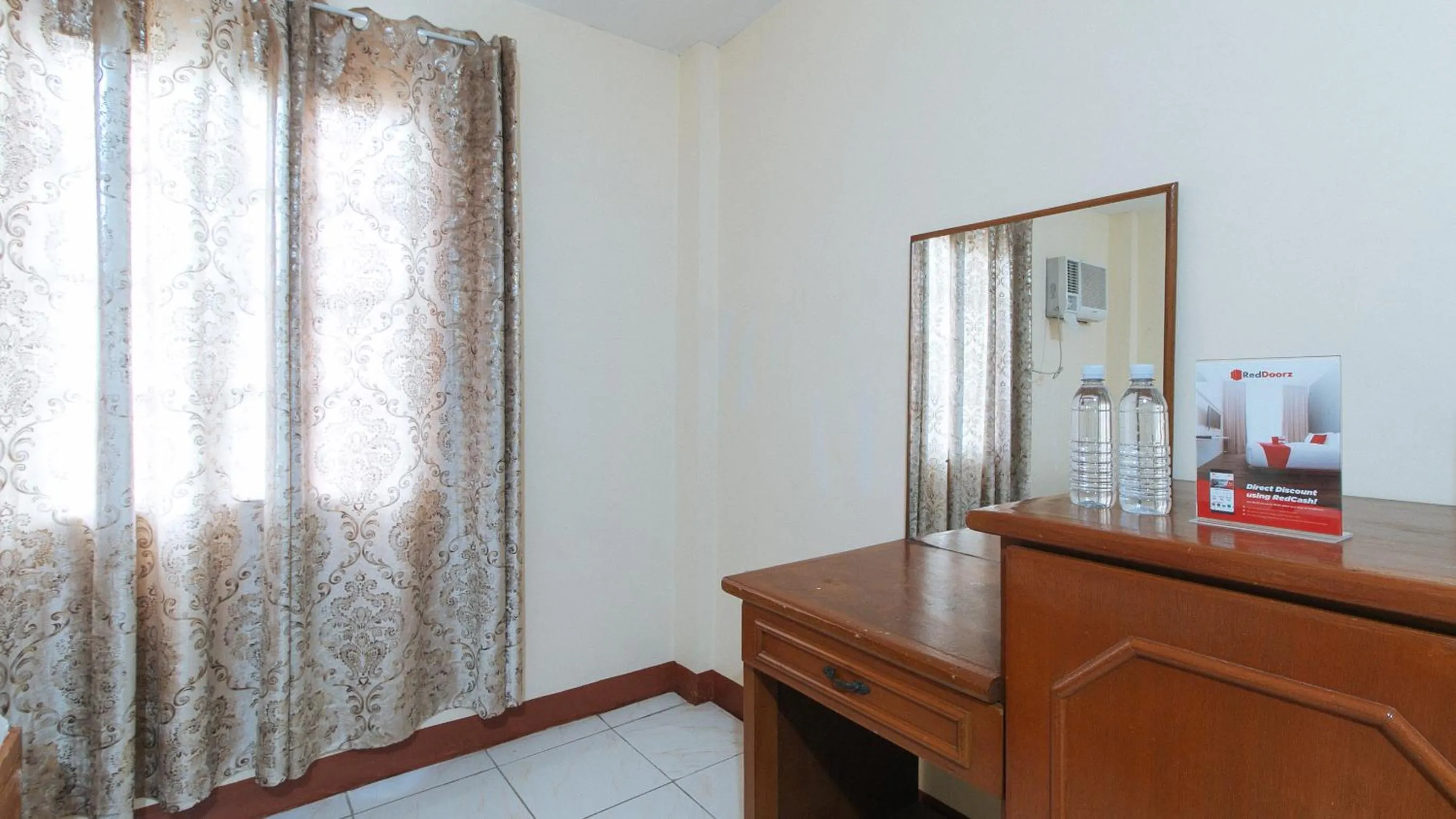 Photo of the whole room, Bed in RedDoorz @ Goldland Spring Resort Urdaneta City