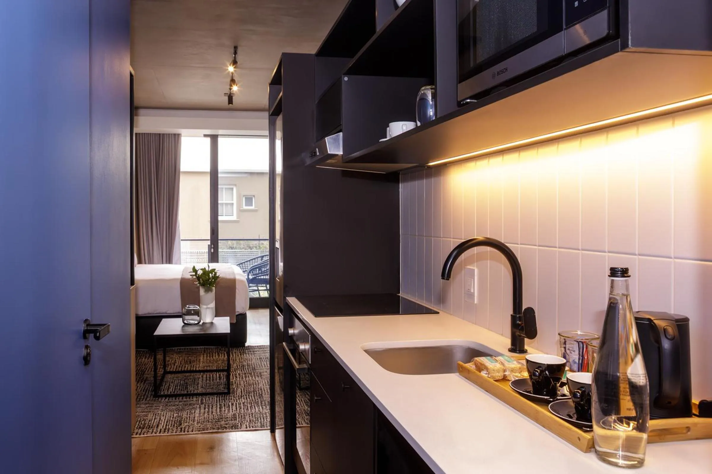 Kitchen or kitchenette in Home Suite Hotels Station House