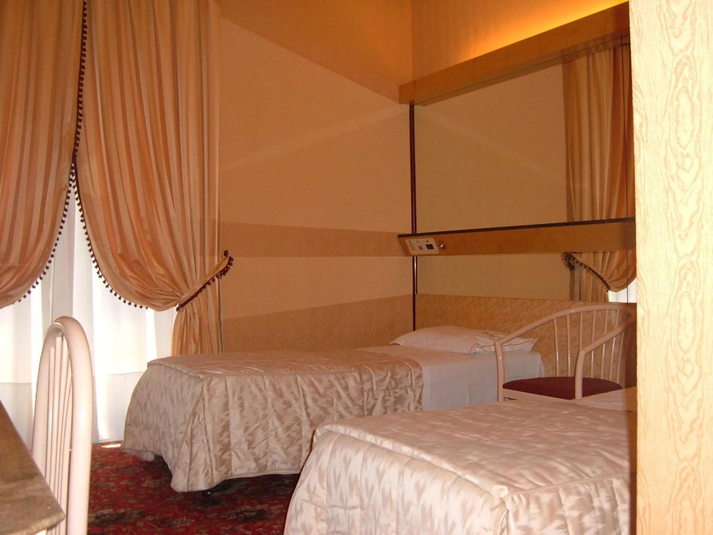 Bed in Hotel Roma