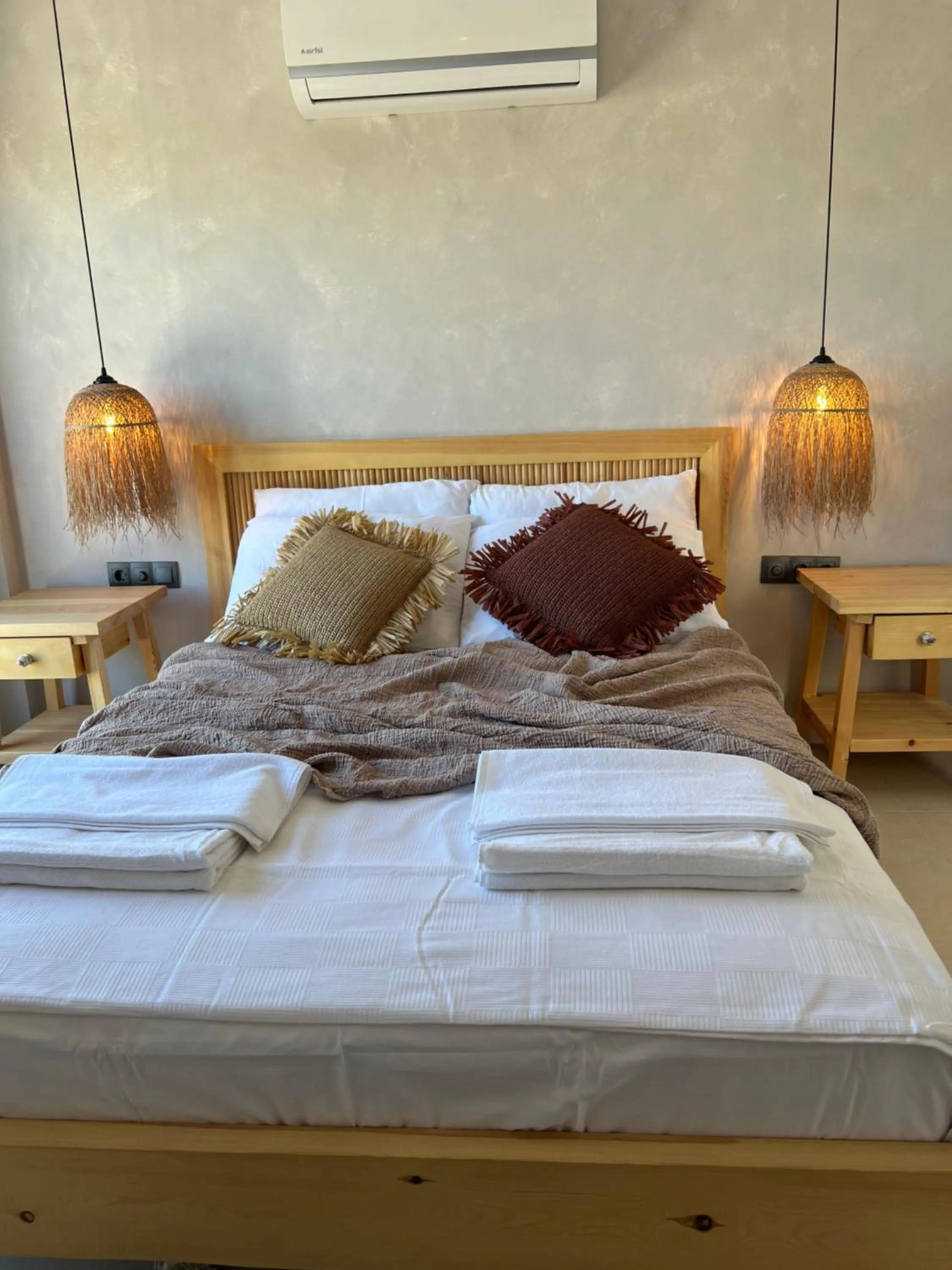 Bed in LAGOM HOTEL