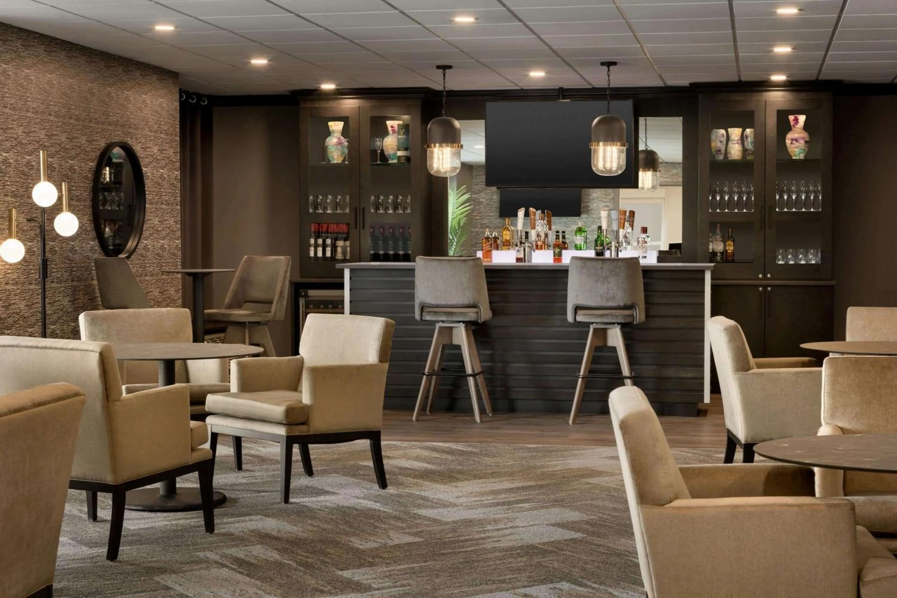 Lounge or bar in Microtel Inn and Suites by Wyndham Weyburn