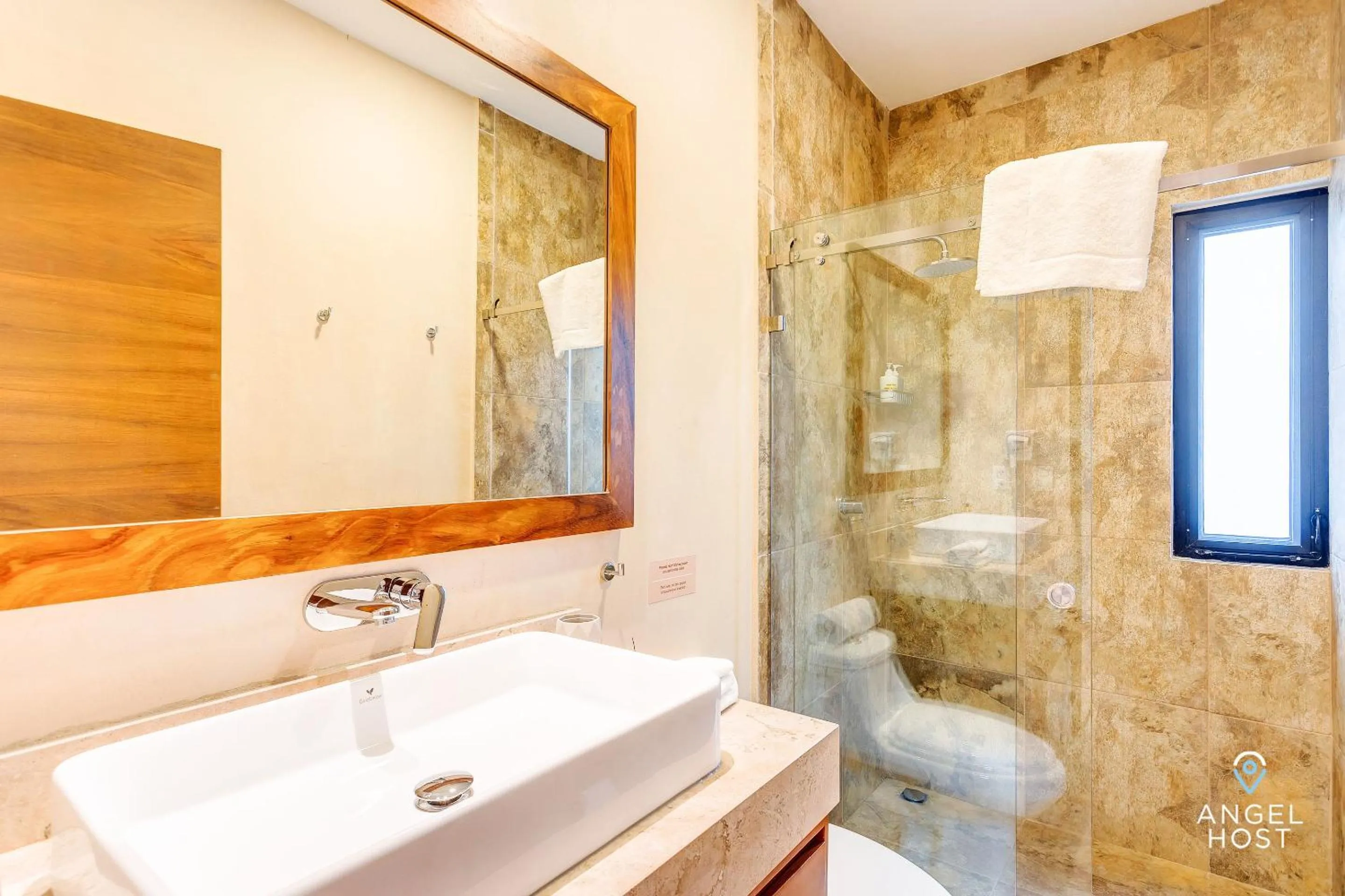 Bathroom in Chic Condotel with Roof Pool 10-Min Walk to Beach