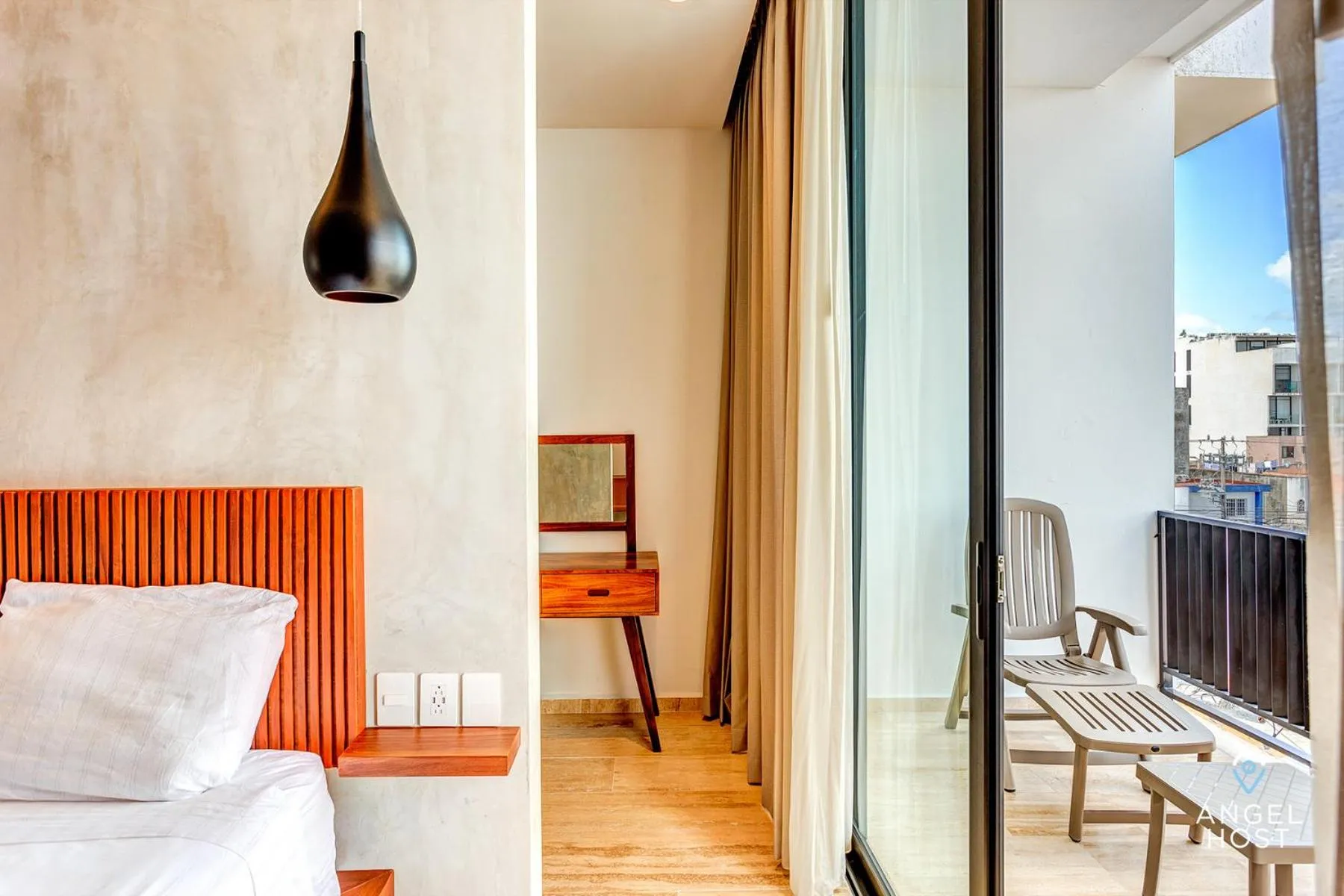 Patio, Bed in Chic Condotel with Roof Pool 10-Min Walk to Beach