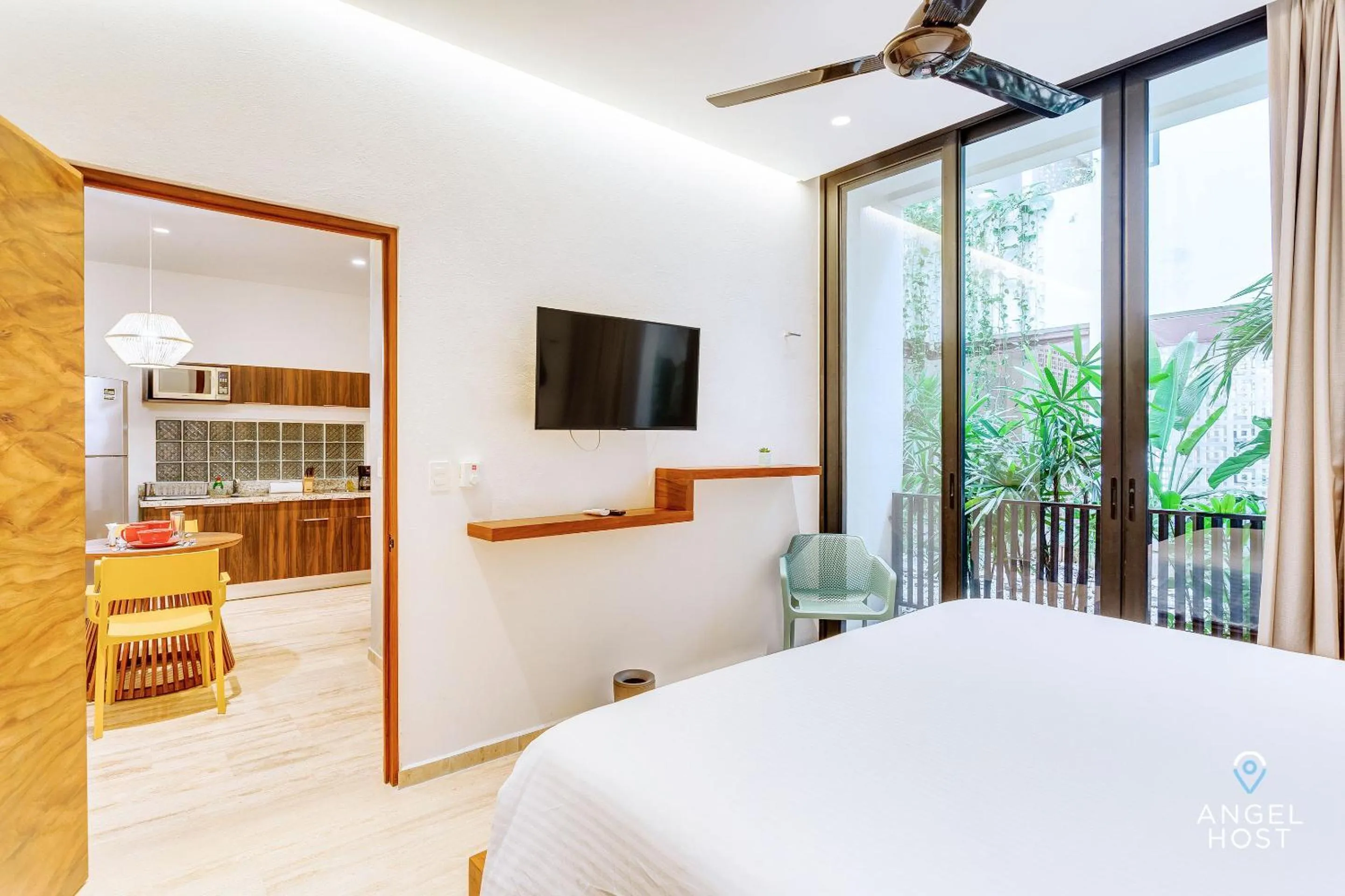 Photo of the whole room, Bed in Chic Condotel with Roof Pool 10-Min Walk to Beach