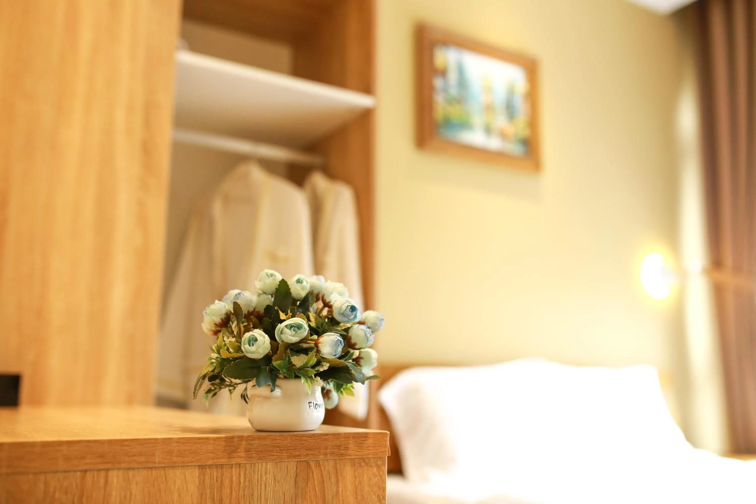 wardrobe, Bed in The Bok Hotel Grand World - by GoGo Phú Quốc