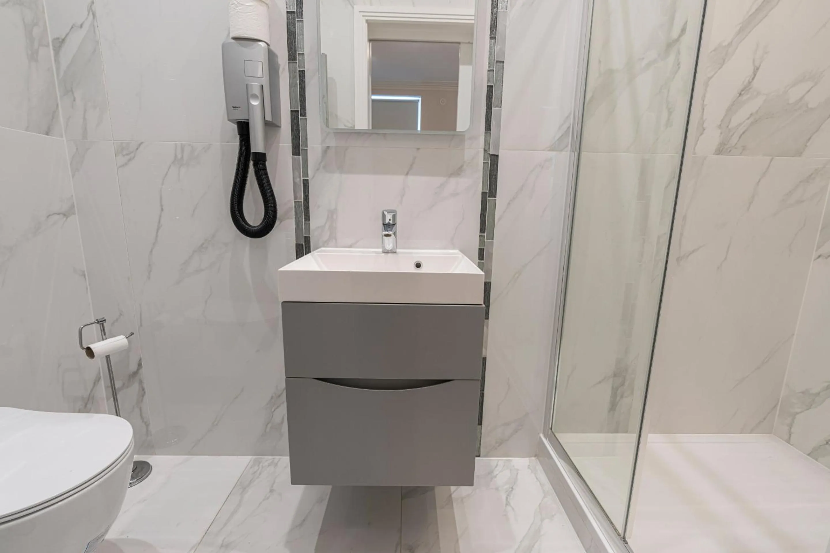 Bathroom in Modern Apartments Near Harrods and the Science Museum