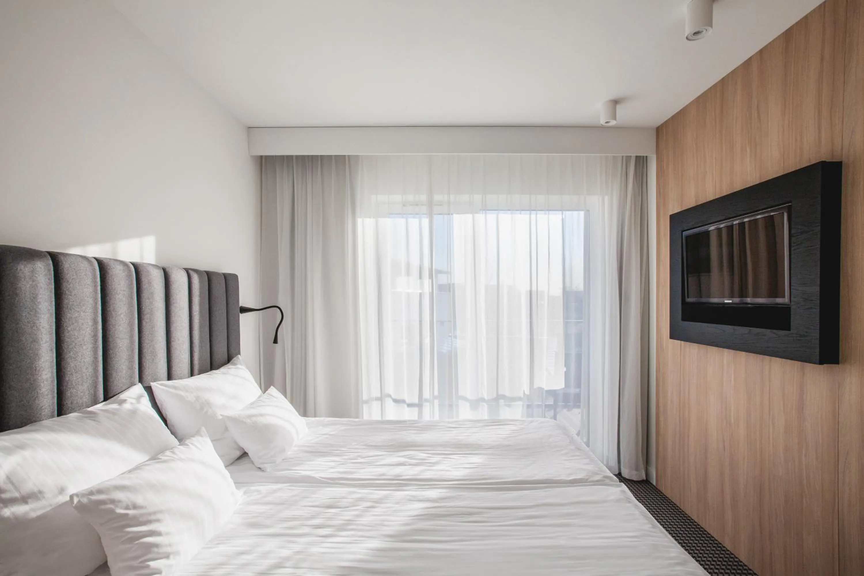 Communal lounge/ TV room, Bed in Hotel Shuum Boutique - Destigo Hotels