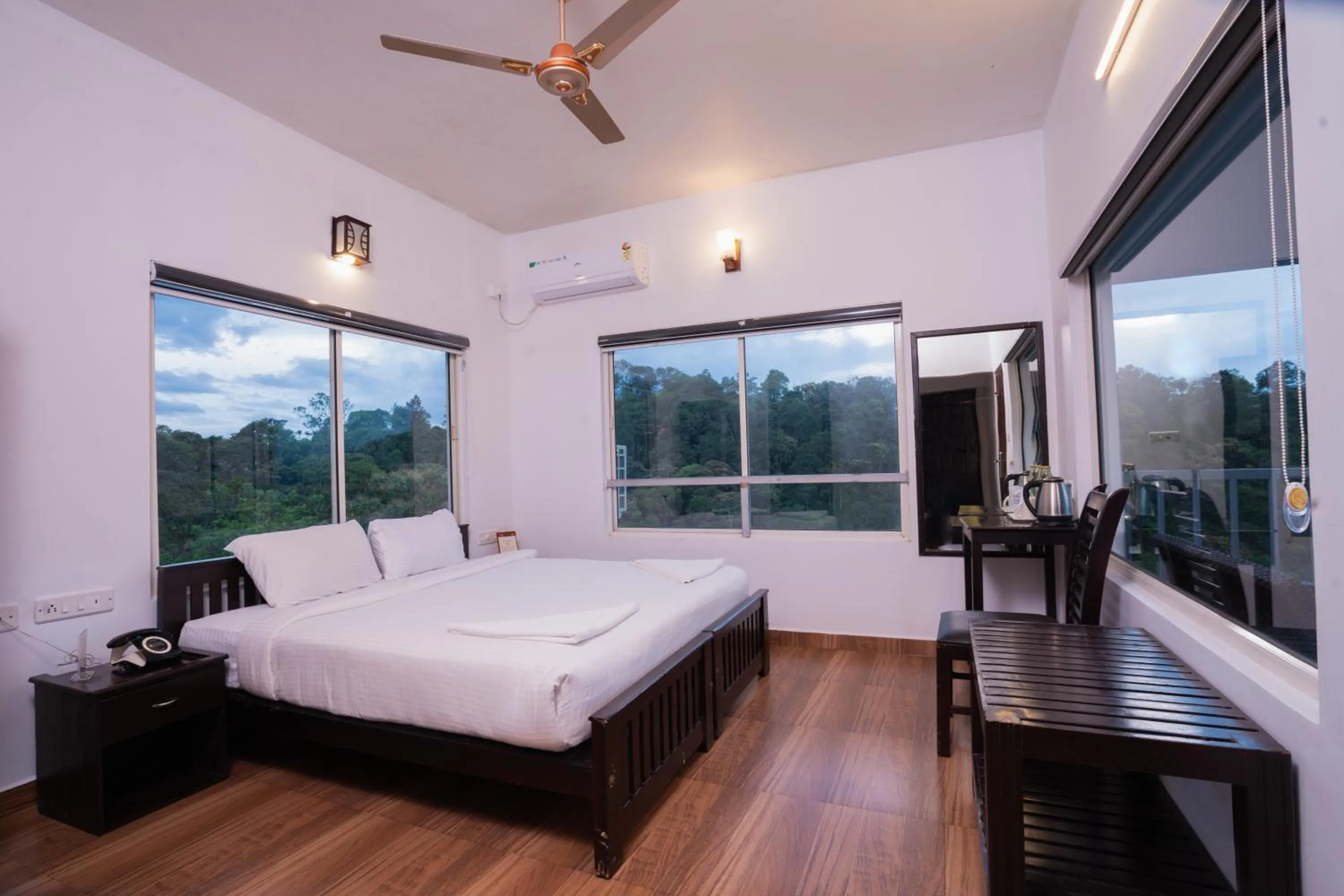 Bed in Eterno Camellia & Elettaria Resort with Pool