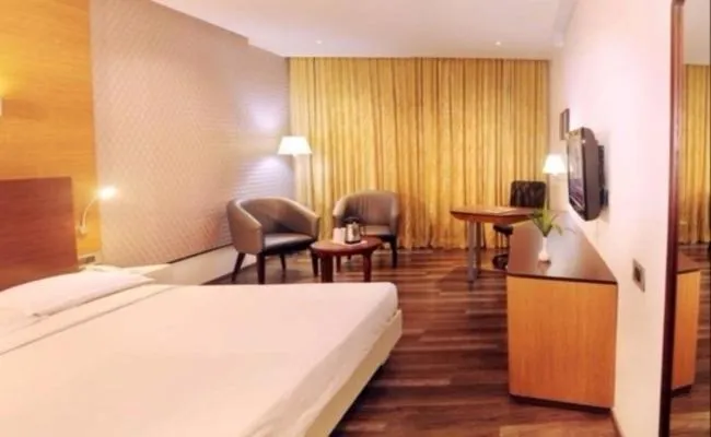 Bed in Hotel Indraprastha