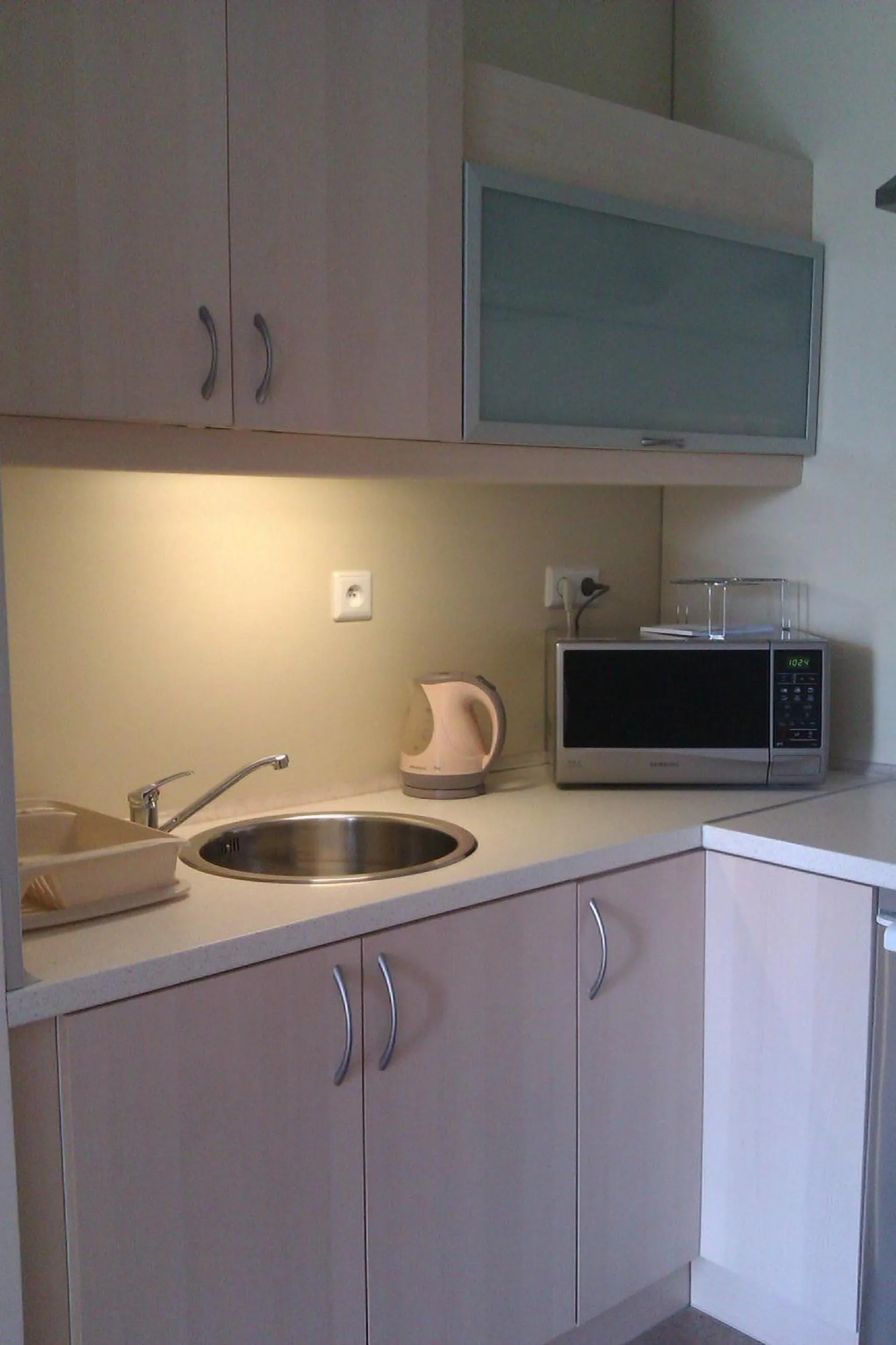 Kitchen or kitchenette in Warsaw Apartments Magnolie