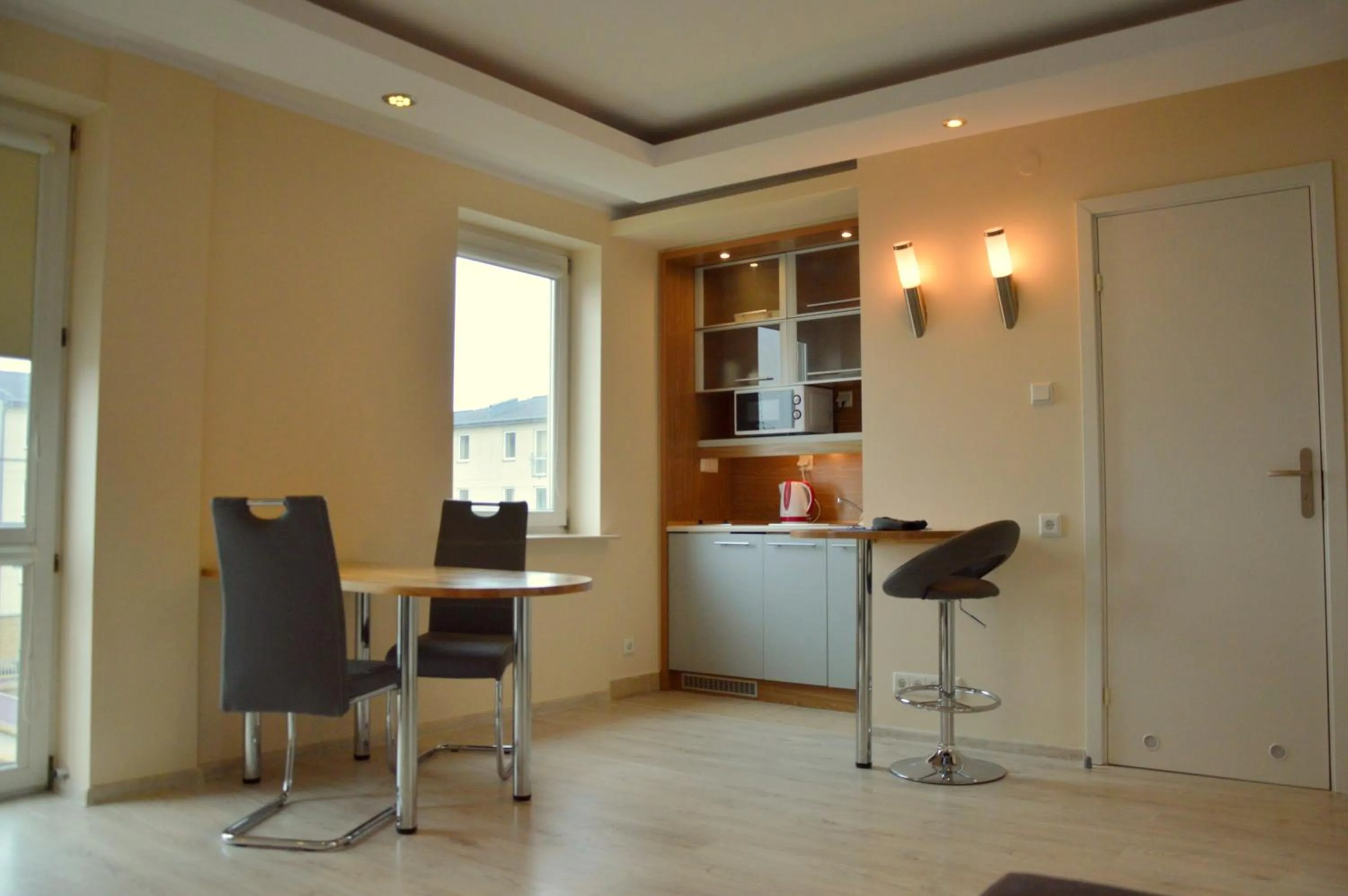 Kitchen or kitchenette in Warsaw Apartments Magnolie