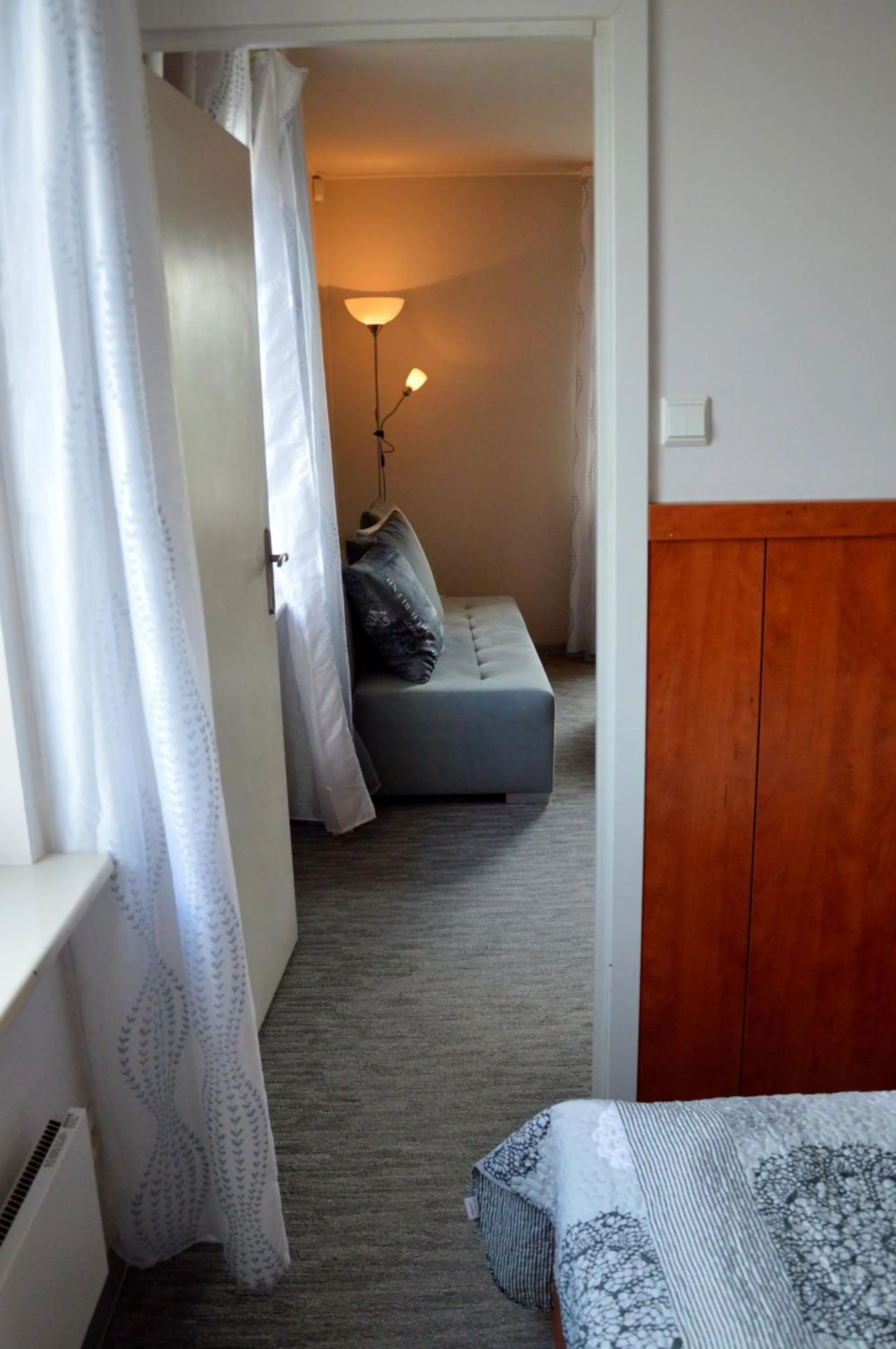 Seating area, Bed in Warsaw Apartments Magnolie