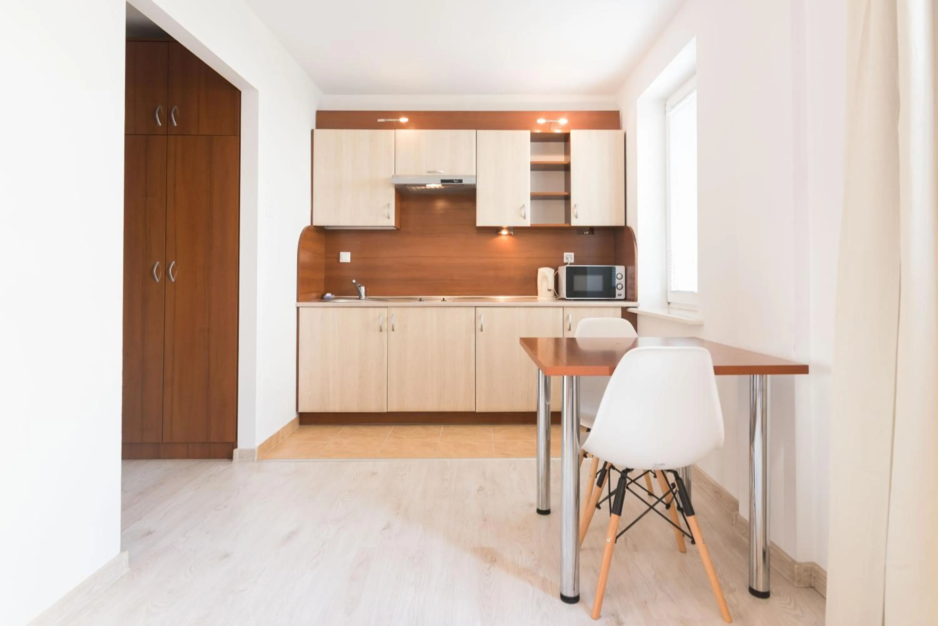 Kitchen or kitchenette in Warsaw Apartments Magnolie