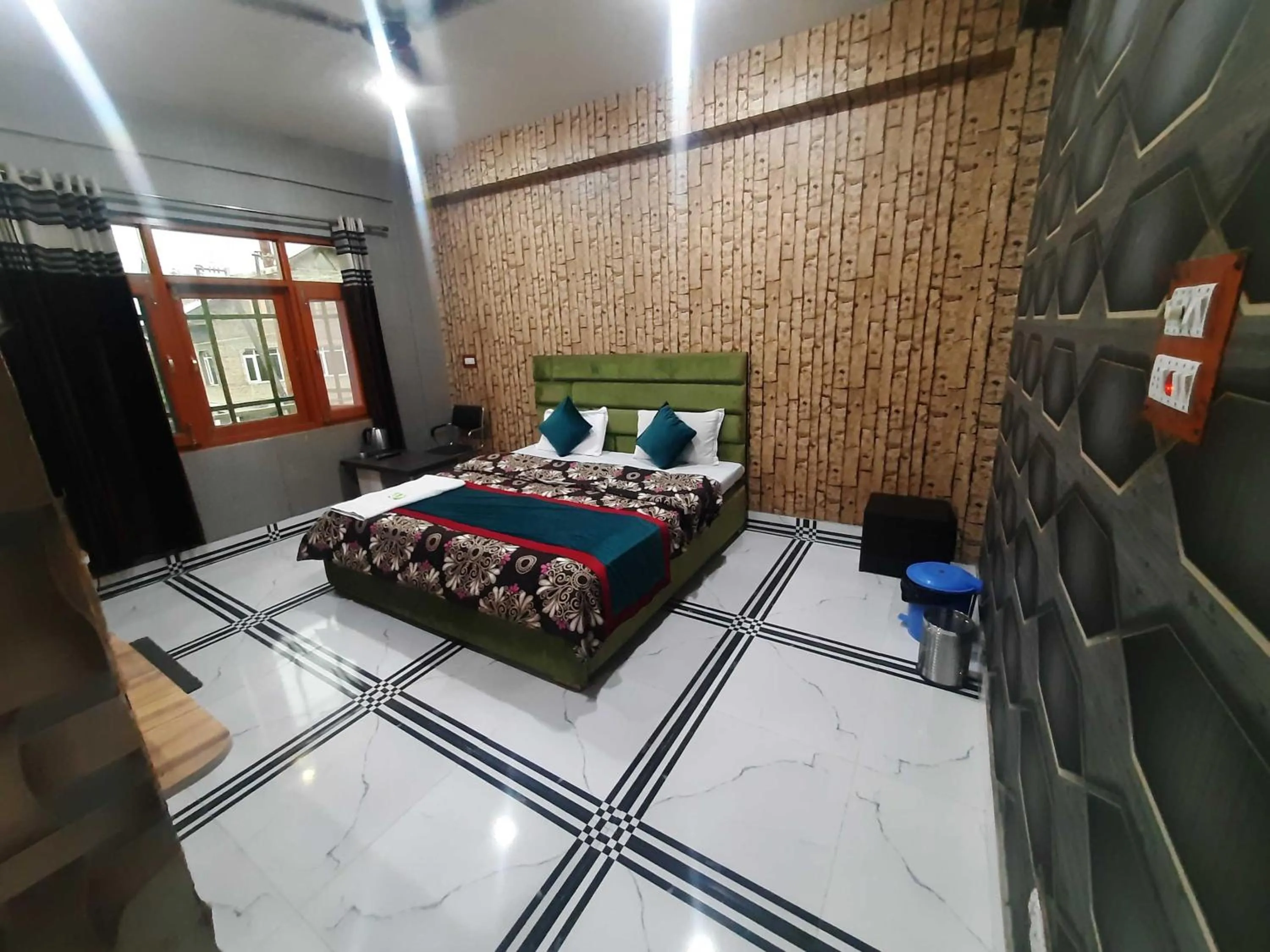 Bedroom in Hotel O by OYO Graceland