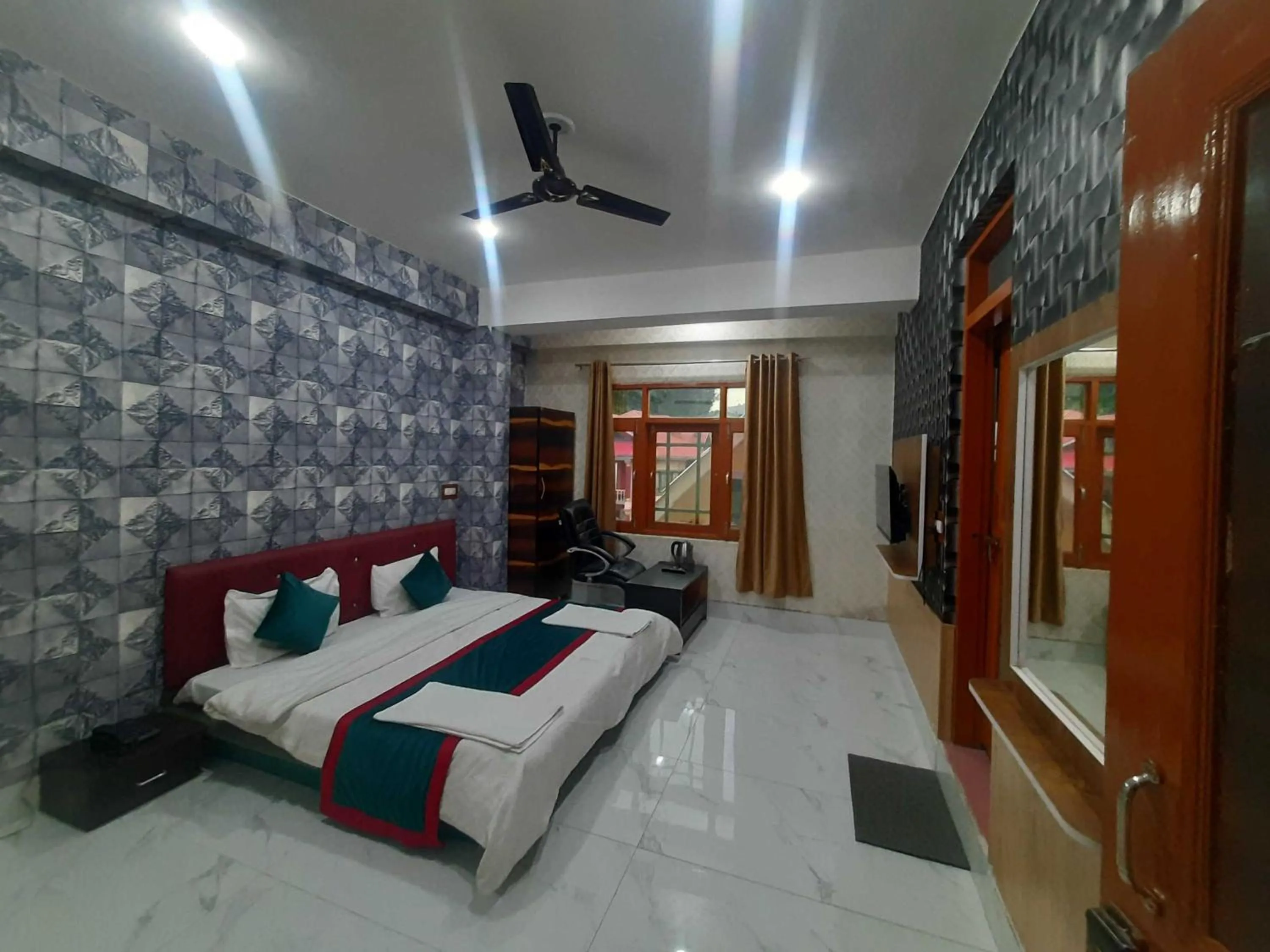 Bedroom in Hotel O by OYO Graceland