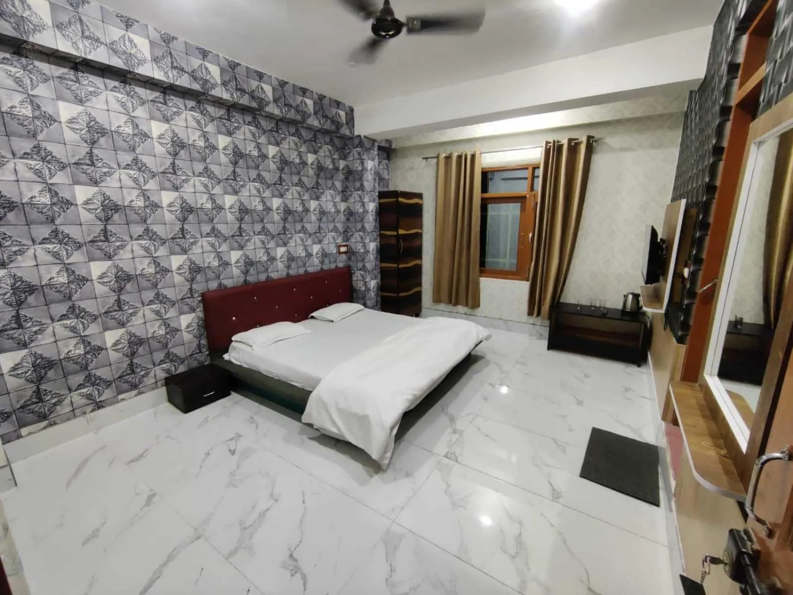 Bedroom in Hotel O by OYO Graceland