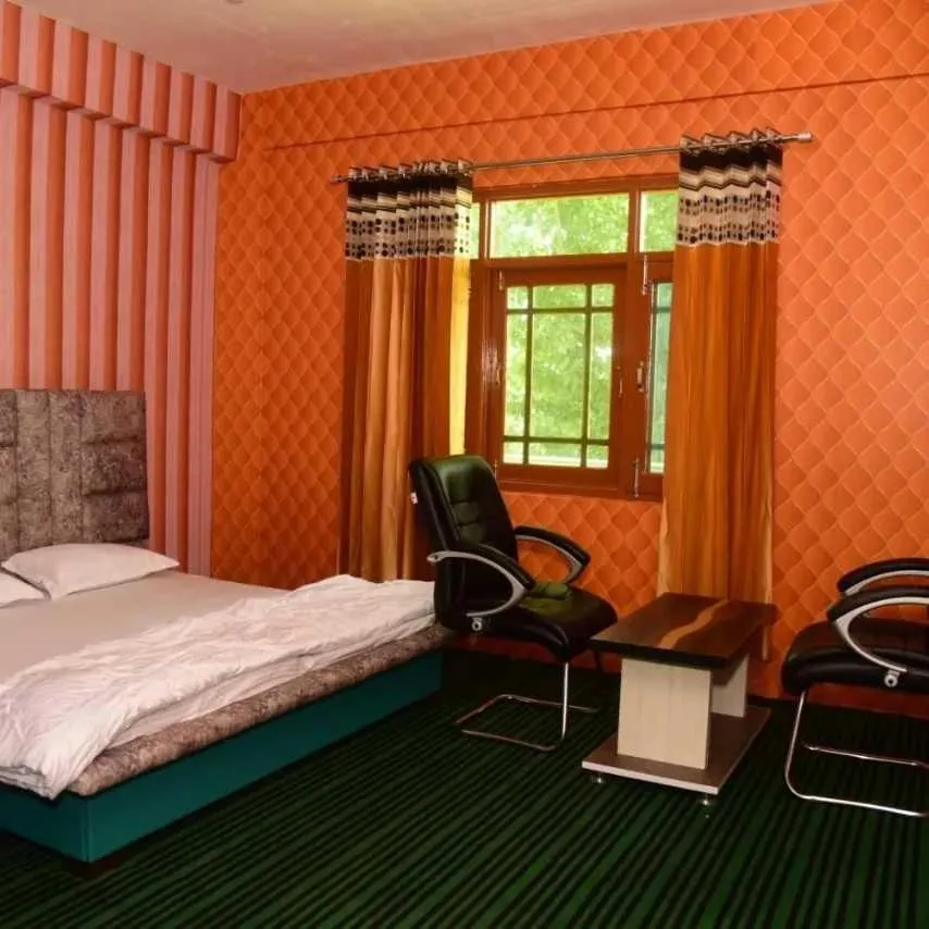 Bedroom in Hotel O by OYO Graceland