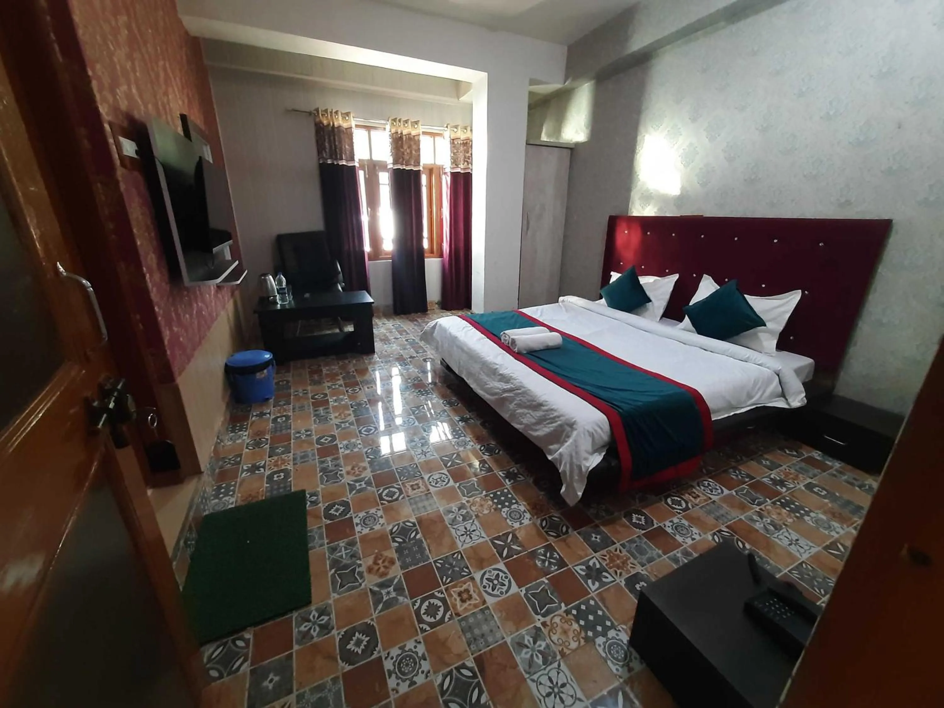 Bedroom in Hotel O by OYO Graceland
