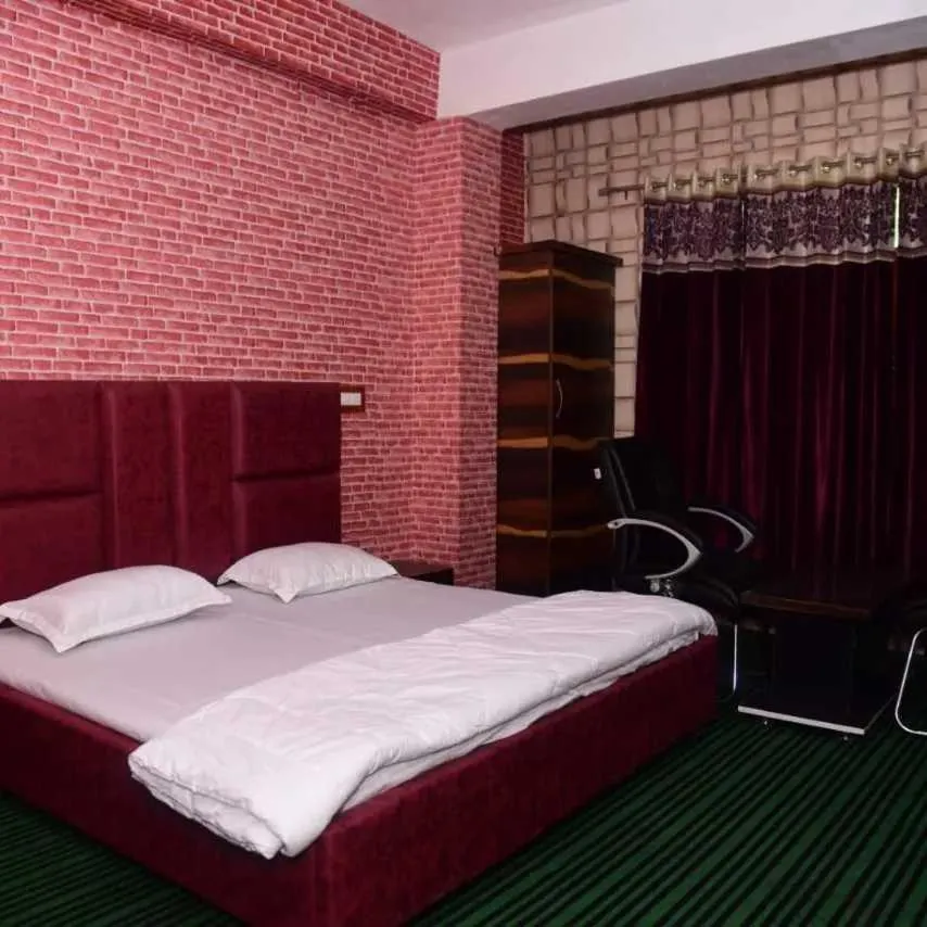 Bedroom in Hotel O by OYO Graceland