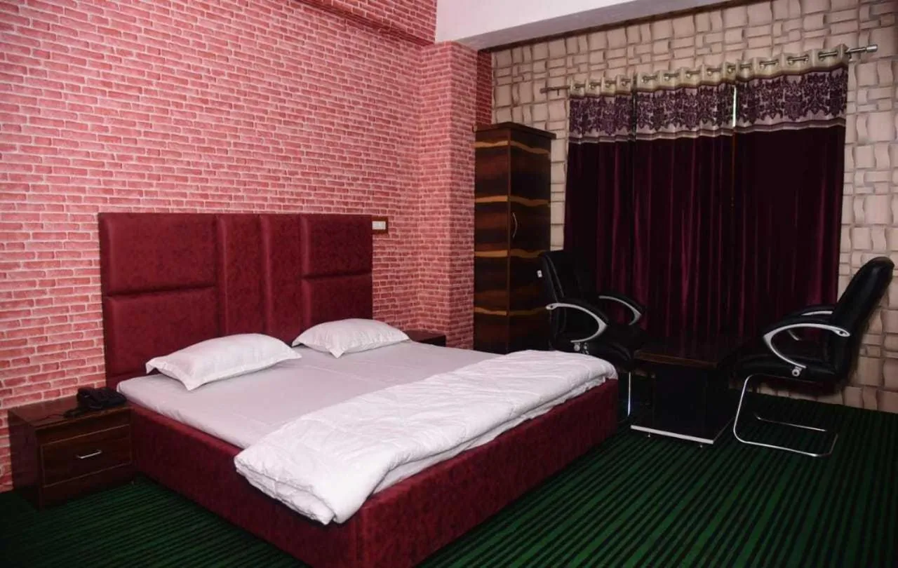 Bedroom in Hotel O by OYO Graceland