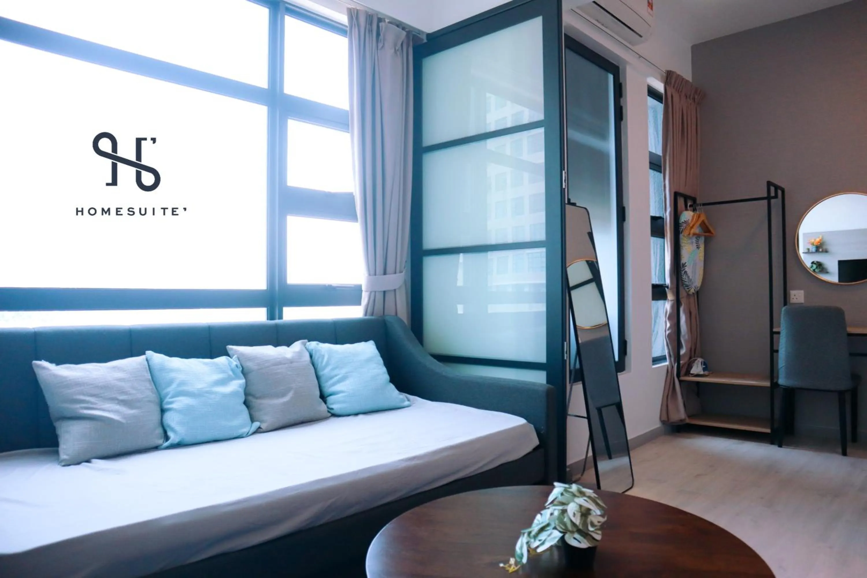 Living room, Bed in Homesuite' Home at Jesselton Quay