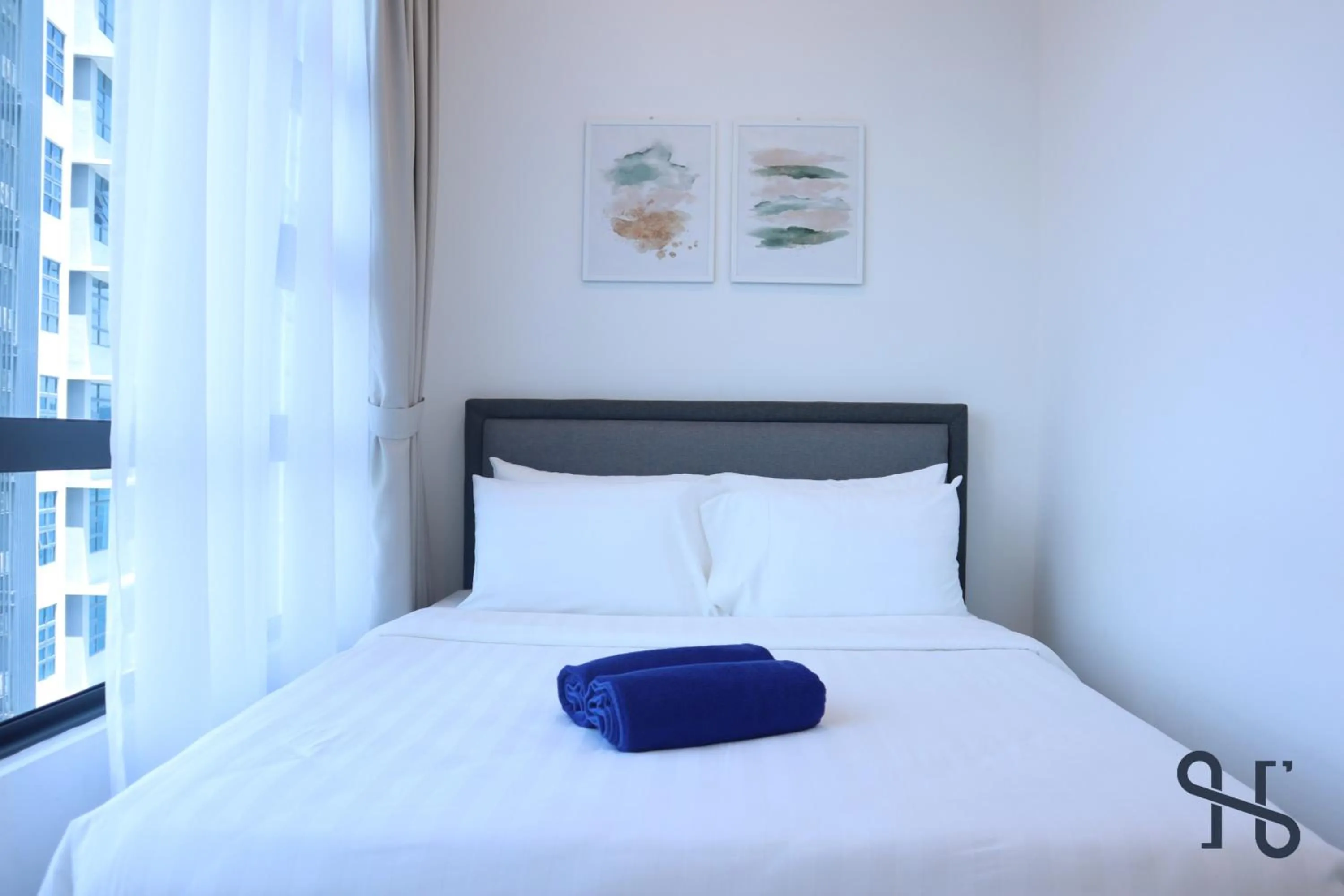 Bed in Homesuite' Home at Jesselton Quay