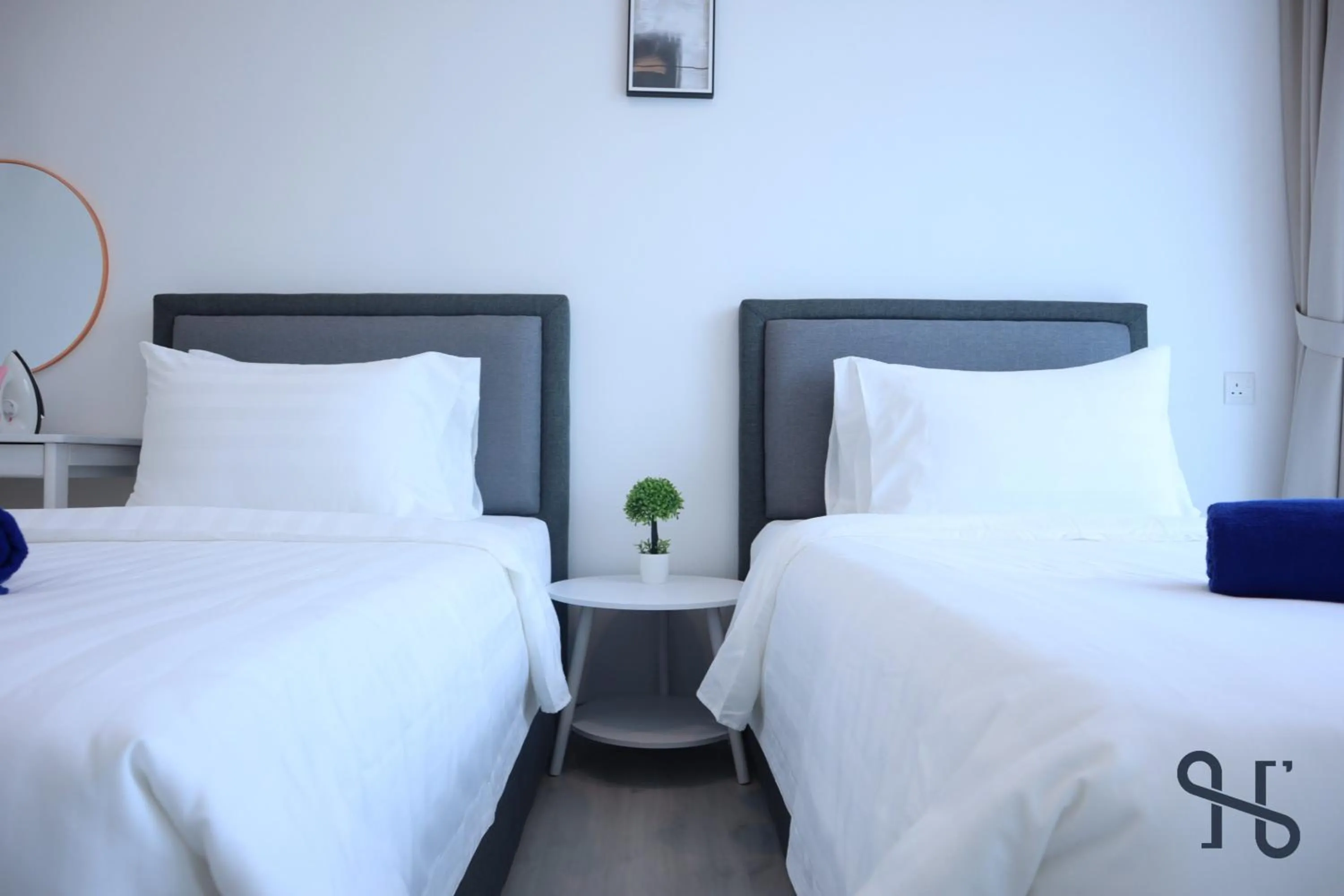 Bed in Homesuite' Home at Jesselton Quay