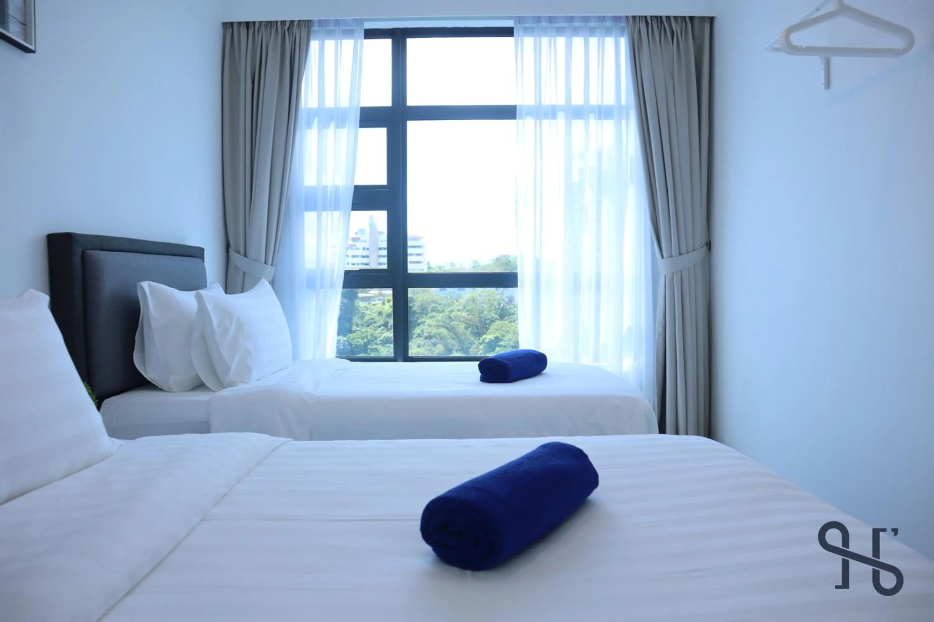 Bed in Homesuite' Home at Jesselton Quay