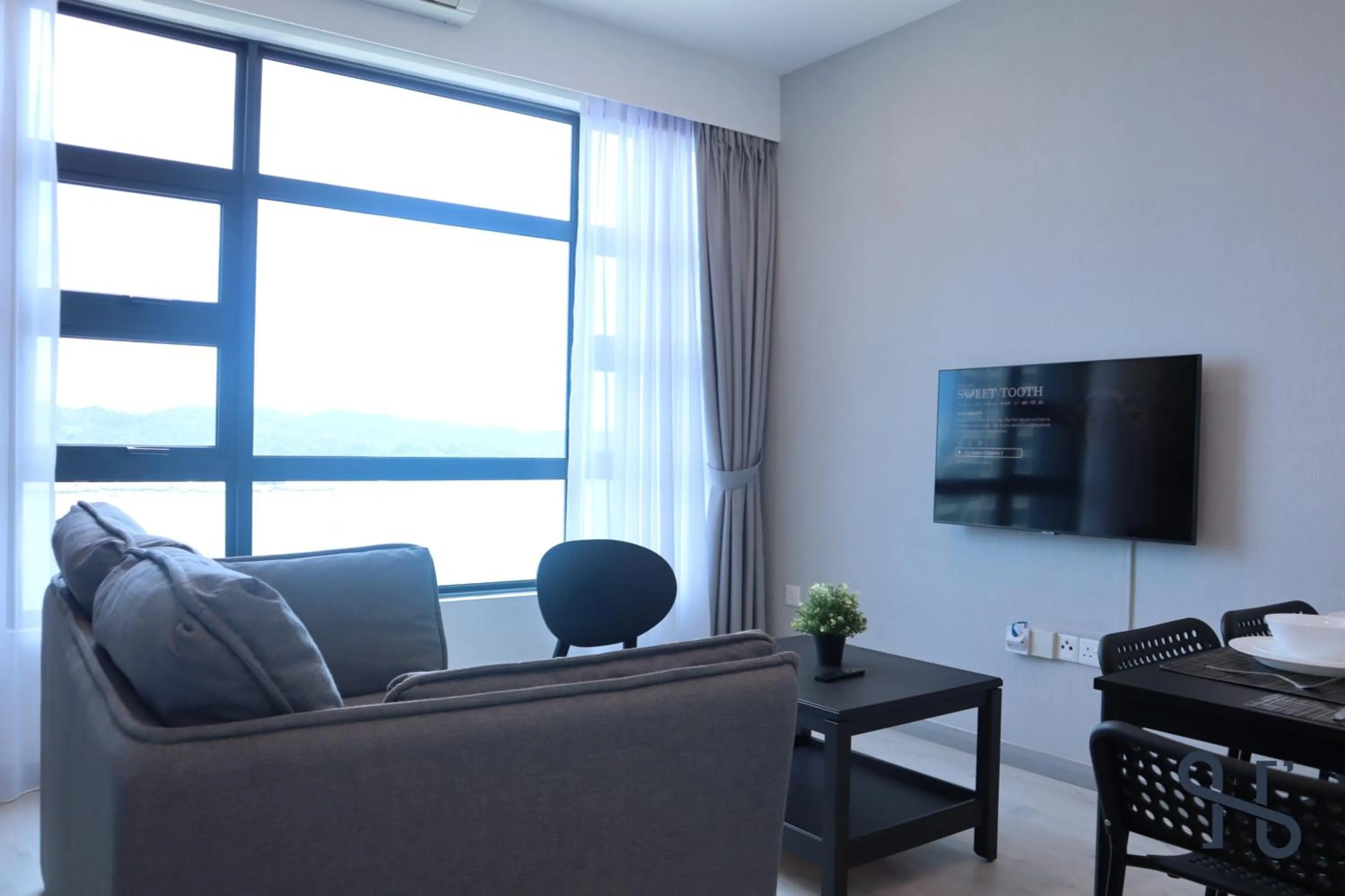 TV and multimedia in Homesuite' Home at Jesselton Quay
