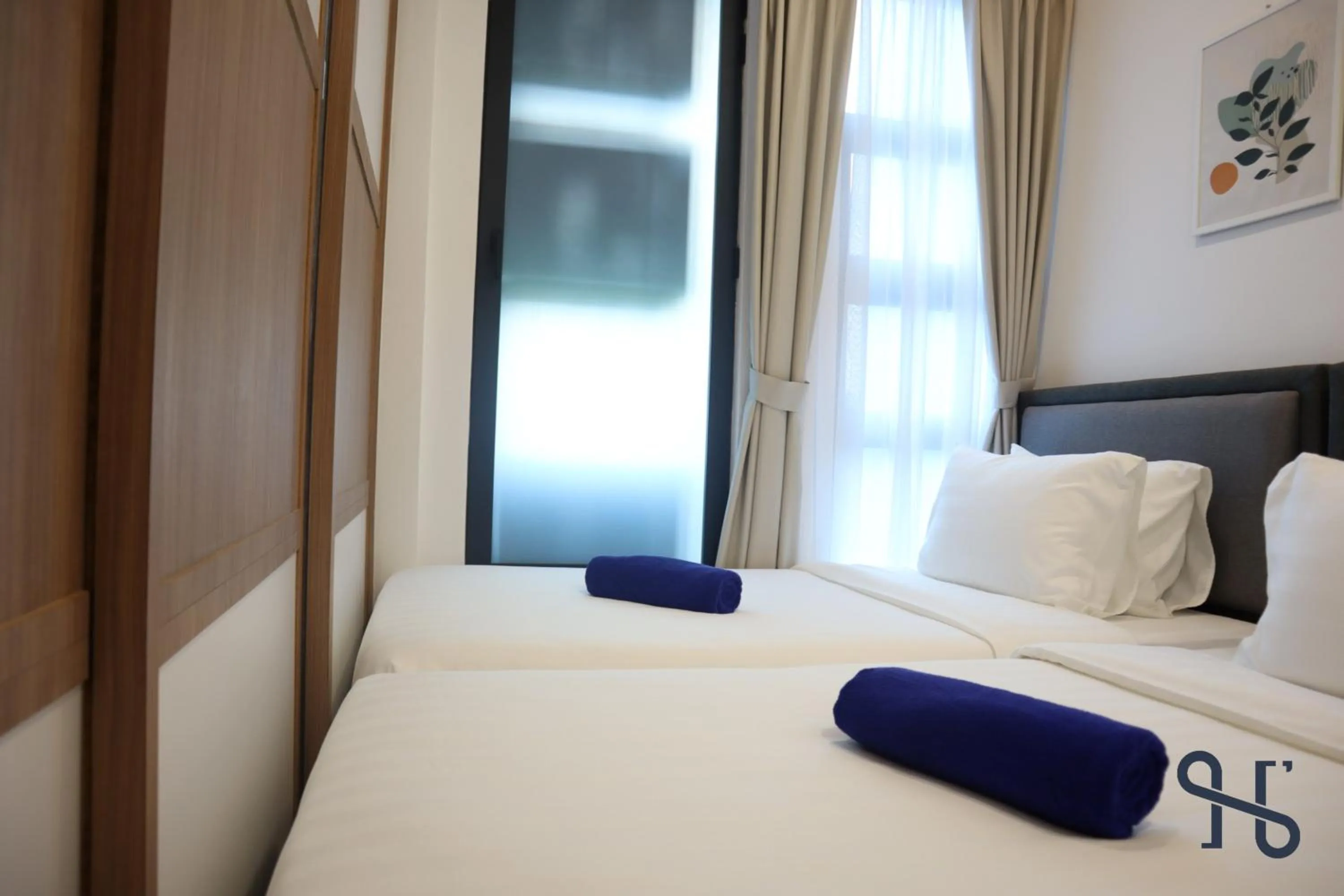 Bed in Homesuite' Home at Jesselton Quay