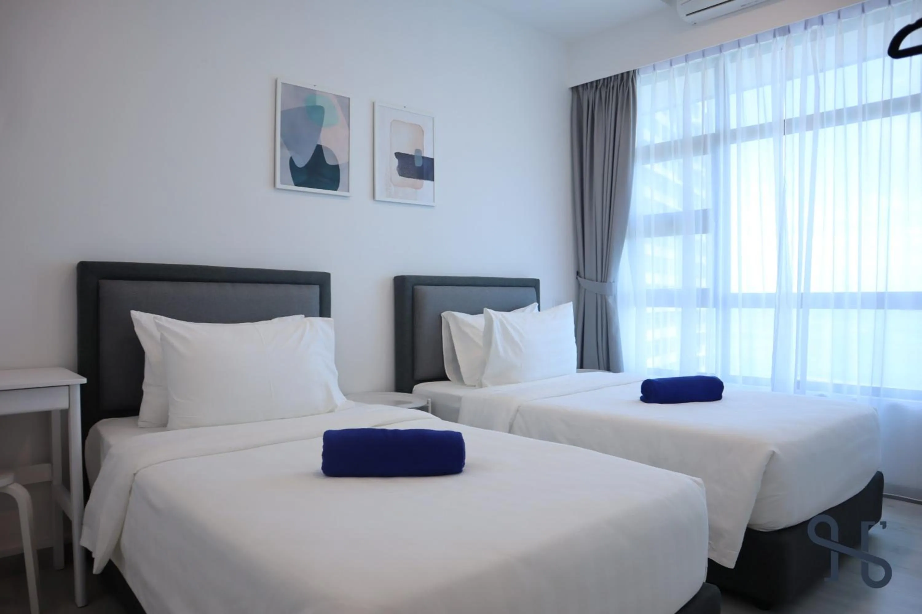 Bed in Homesuite' Home at Jesselton Quay