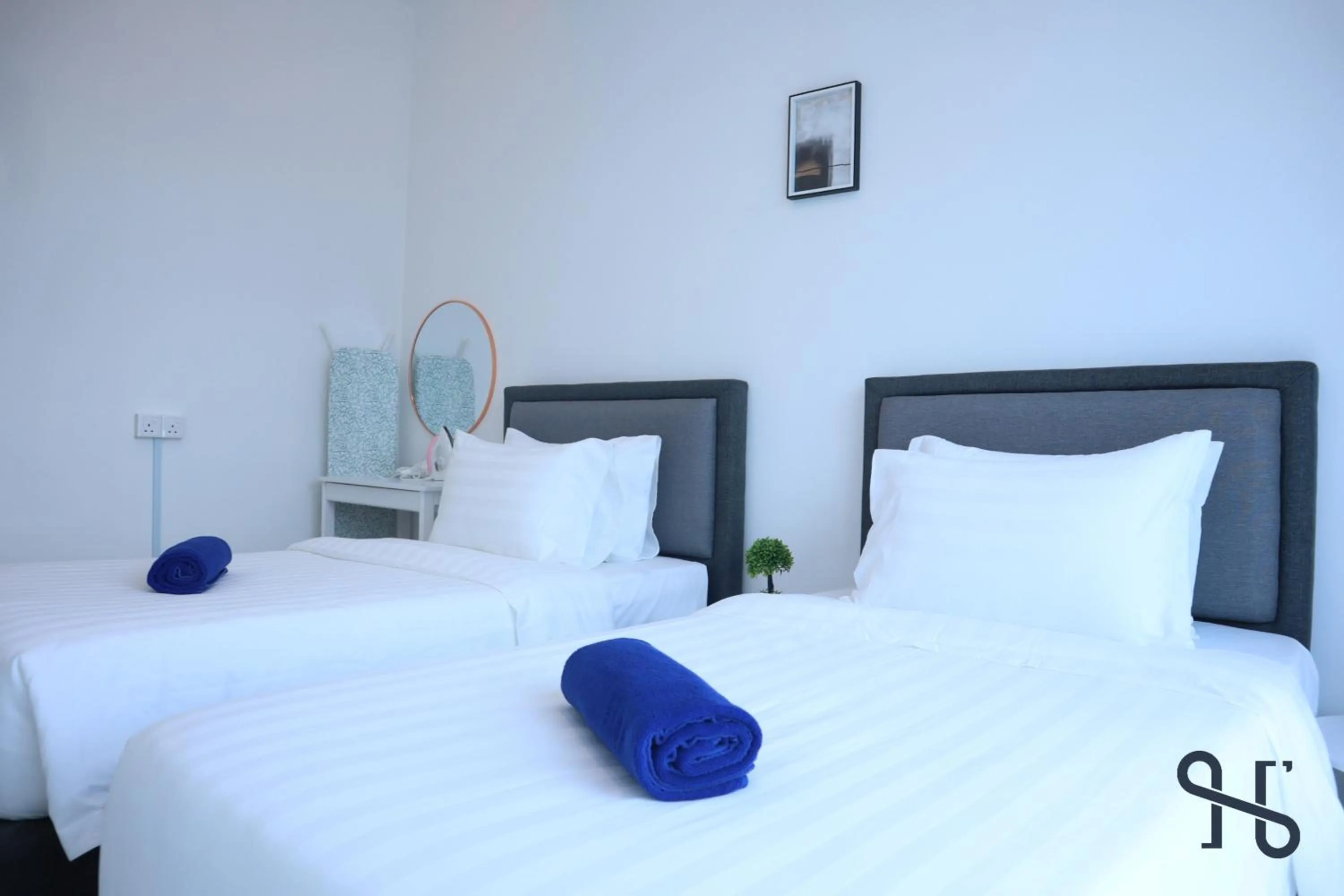 Bed in Homesuite' Home at Jesselton Quay