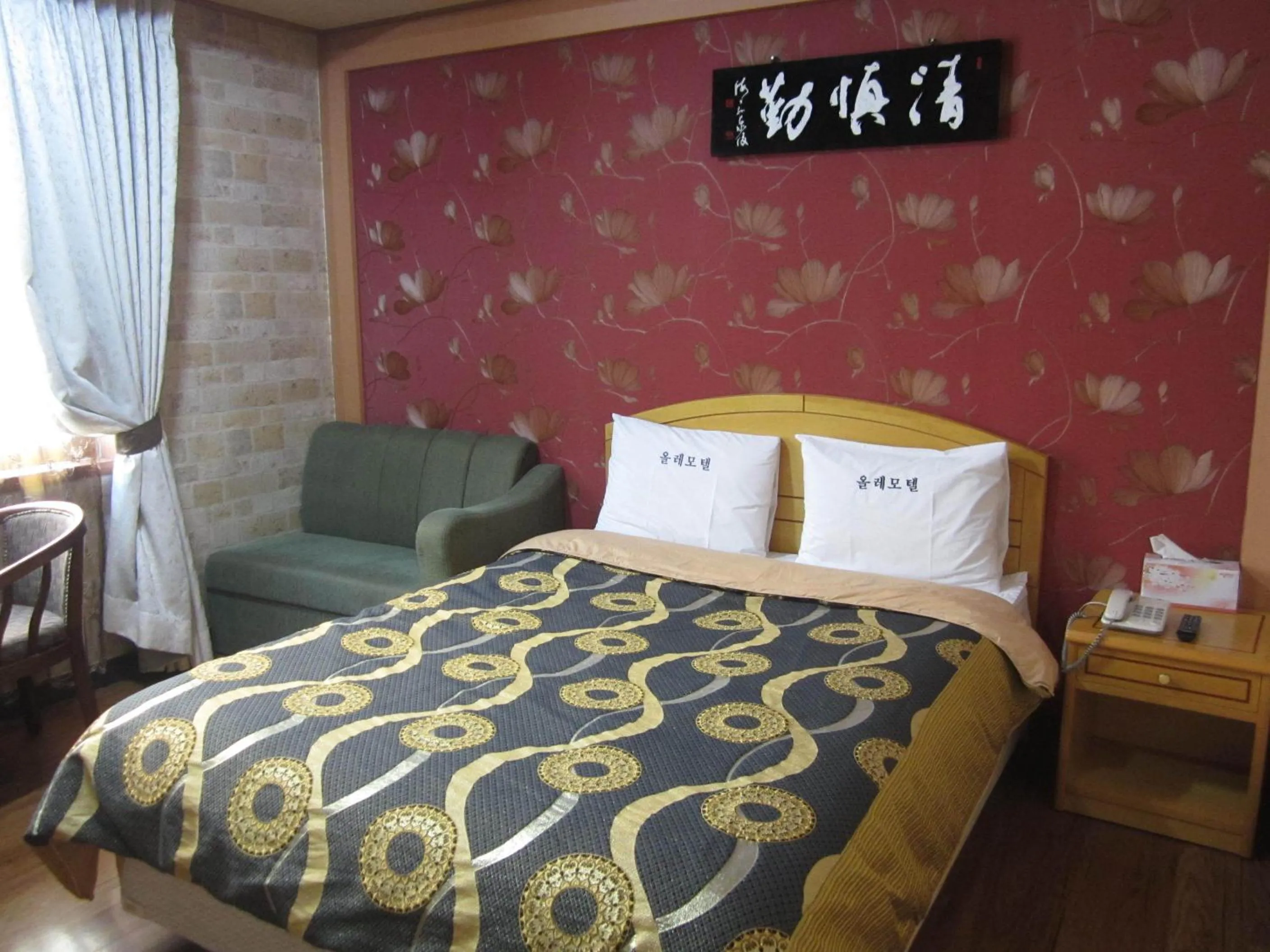 Bed in Jeju Olleh Hotel