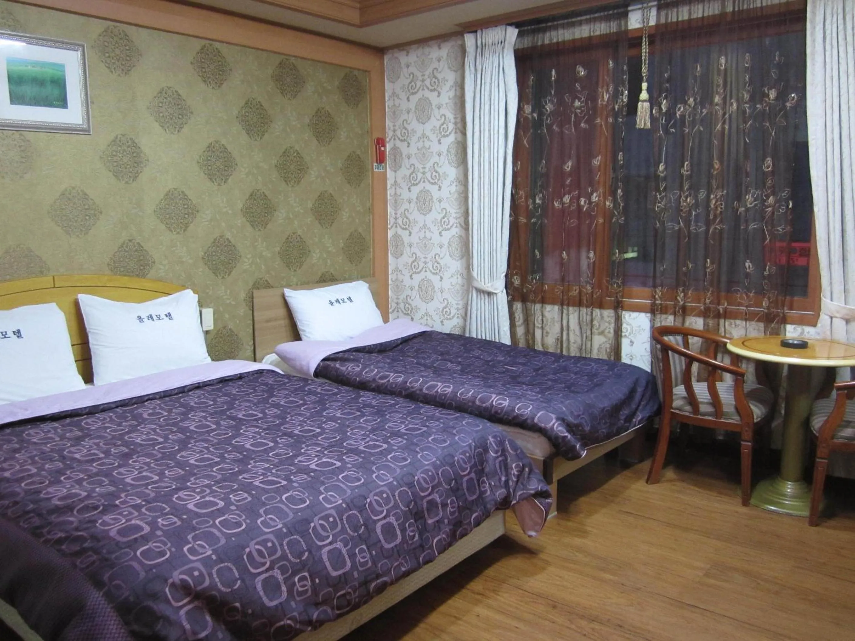 Bed in Jeju Olleh Hotel