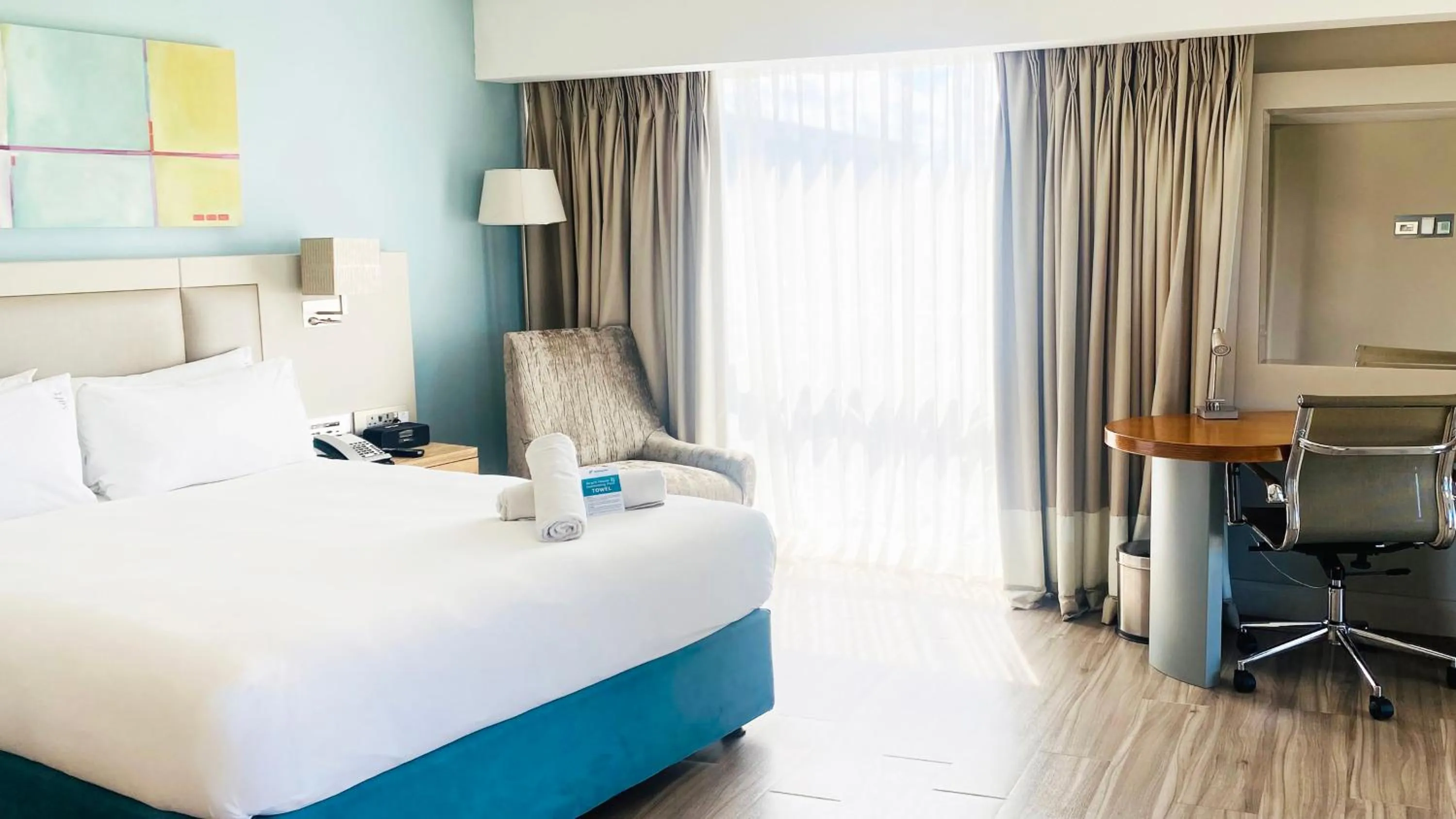 Photo of the whole room, Bed in Holiday Inn Mauritius Mon Trésor by IHG