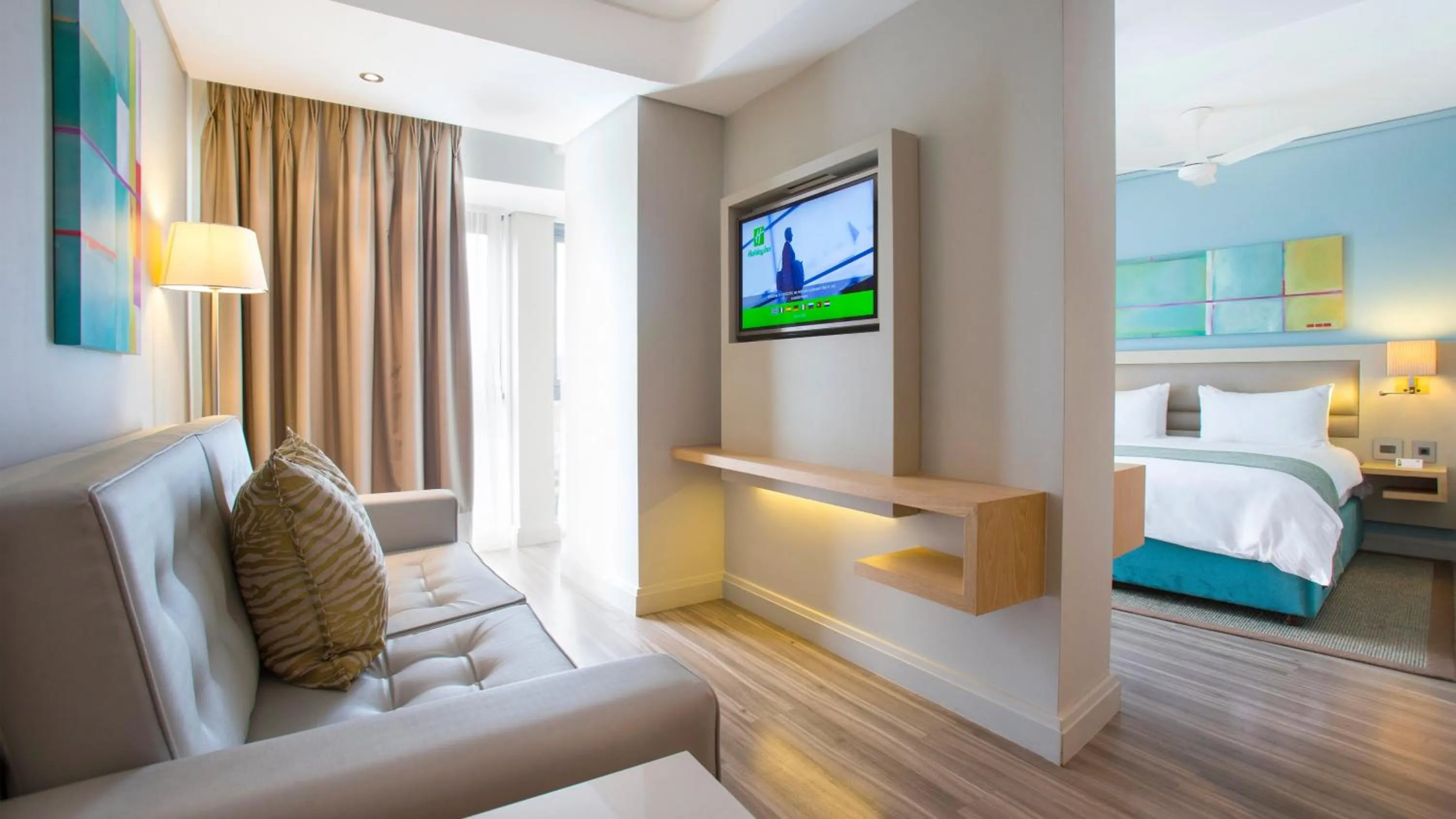 Photo of the whole room, Bed in Holiday Inn Mauritius Mon Trésor by IHG