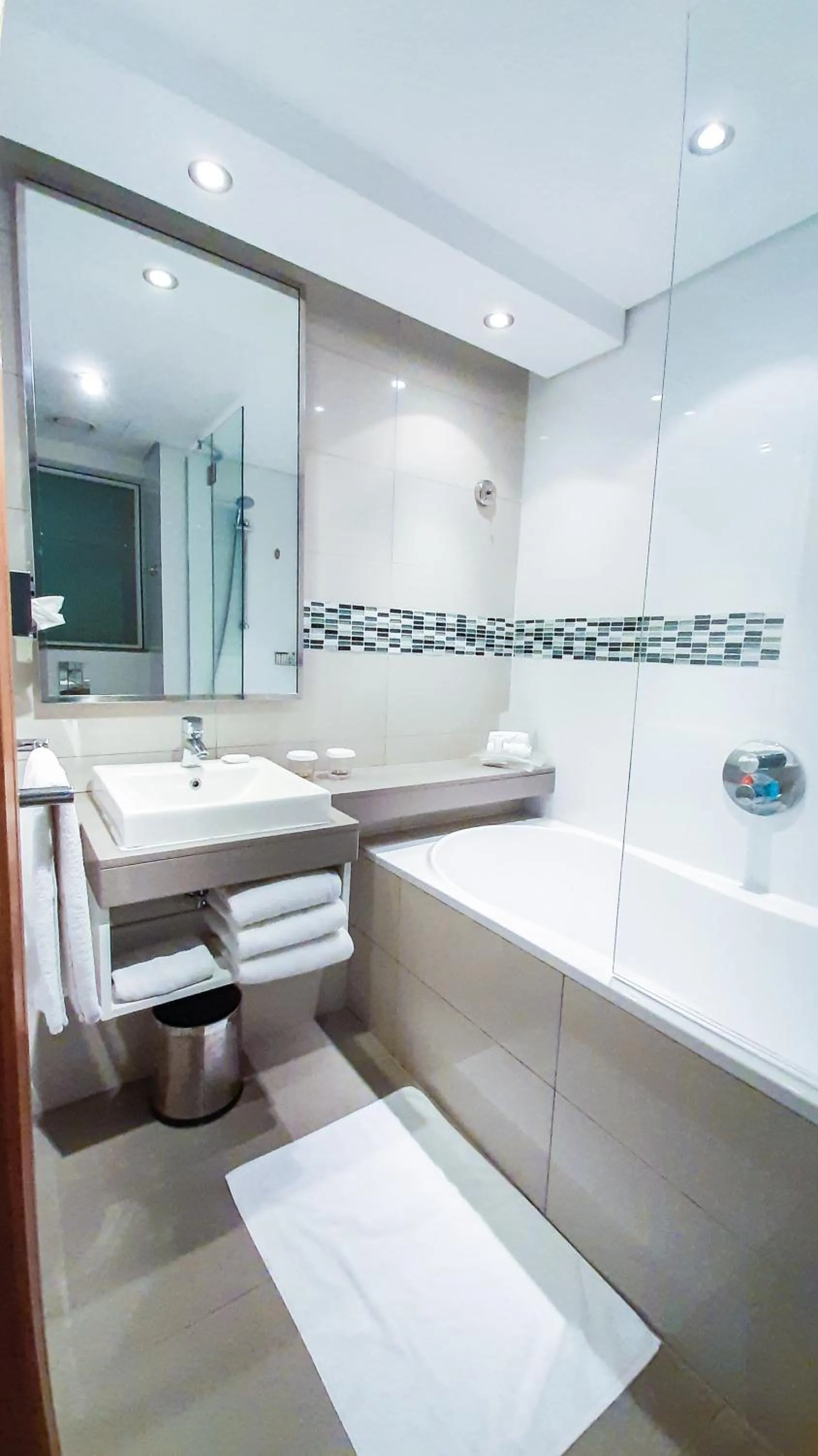 Bathroom in Holiday Inn Mauritius Mon Trésor by IHG