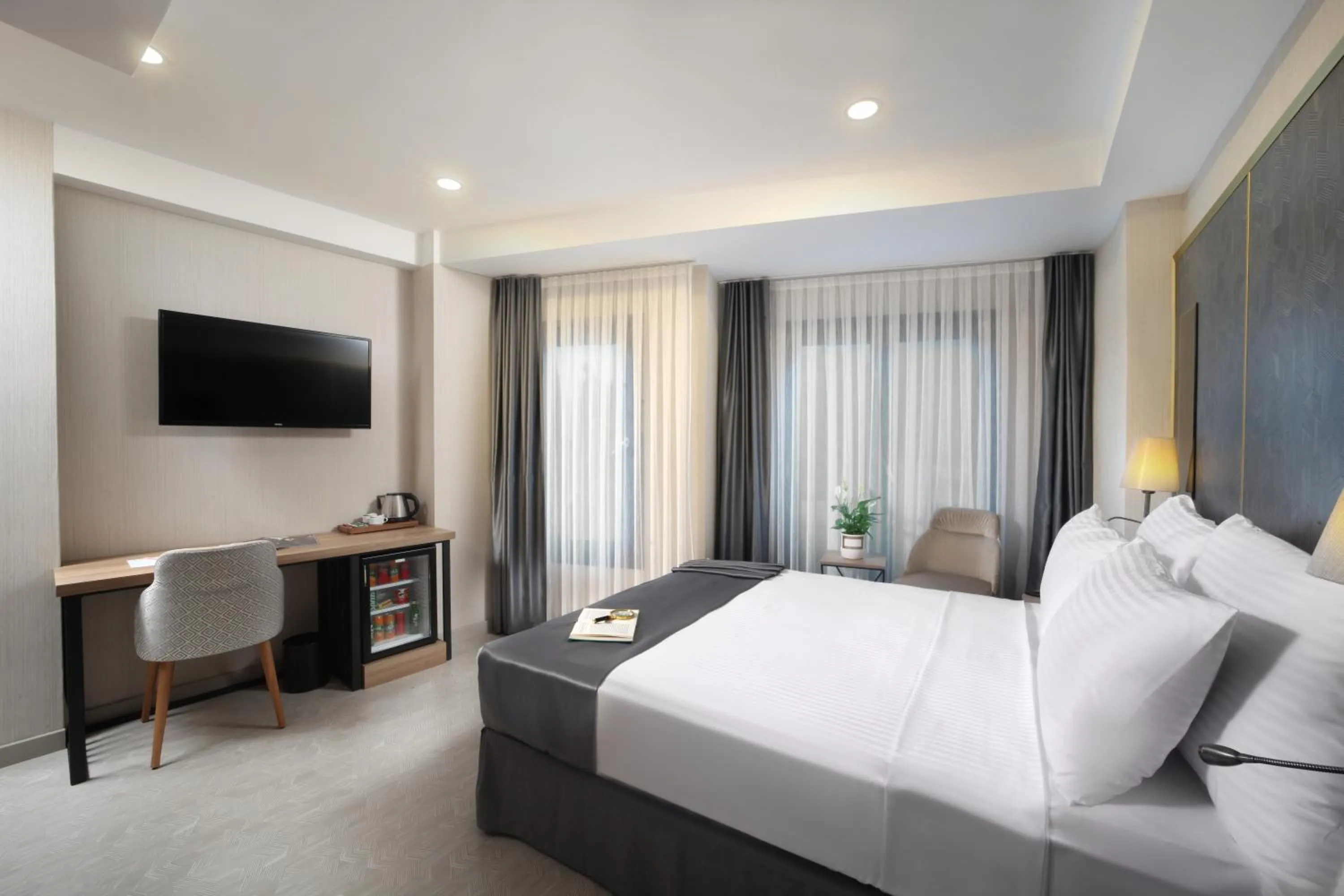 Bed in Imagine Hotel-Special Category